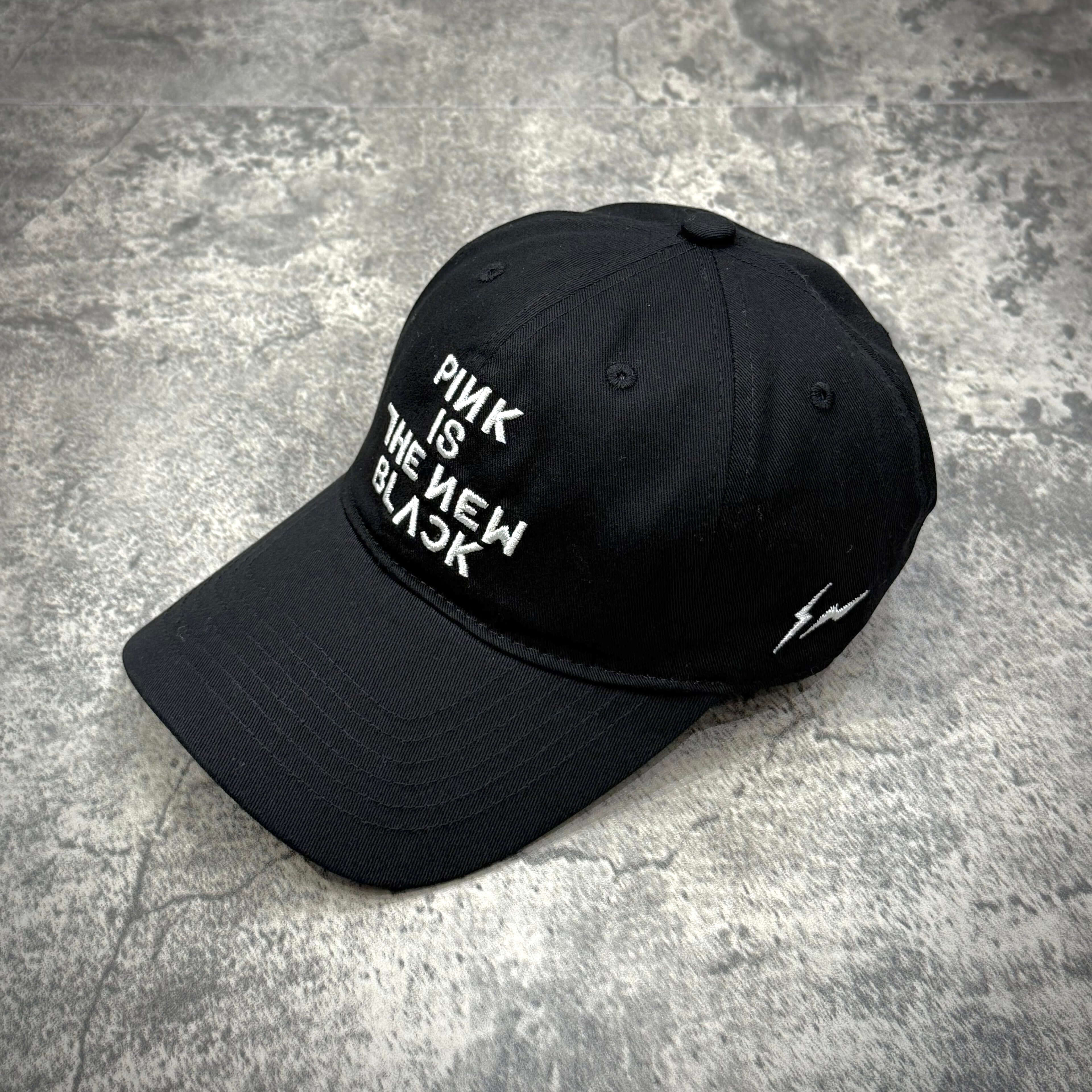 Fragment x Blackpink Cap featuring 'PINK IS THE NEW BLACK' text in stylish embroidery.