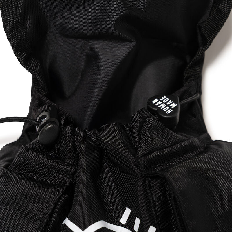 Close-up of the Human Made Military Multi Pouch showing the drawstring and interior details.