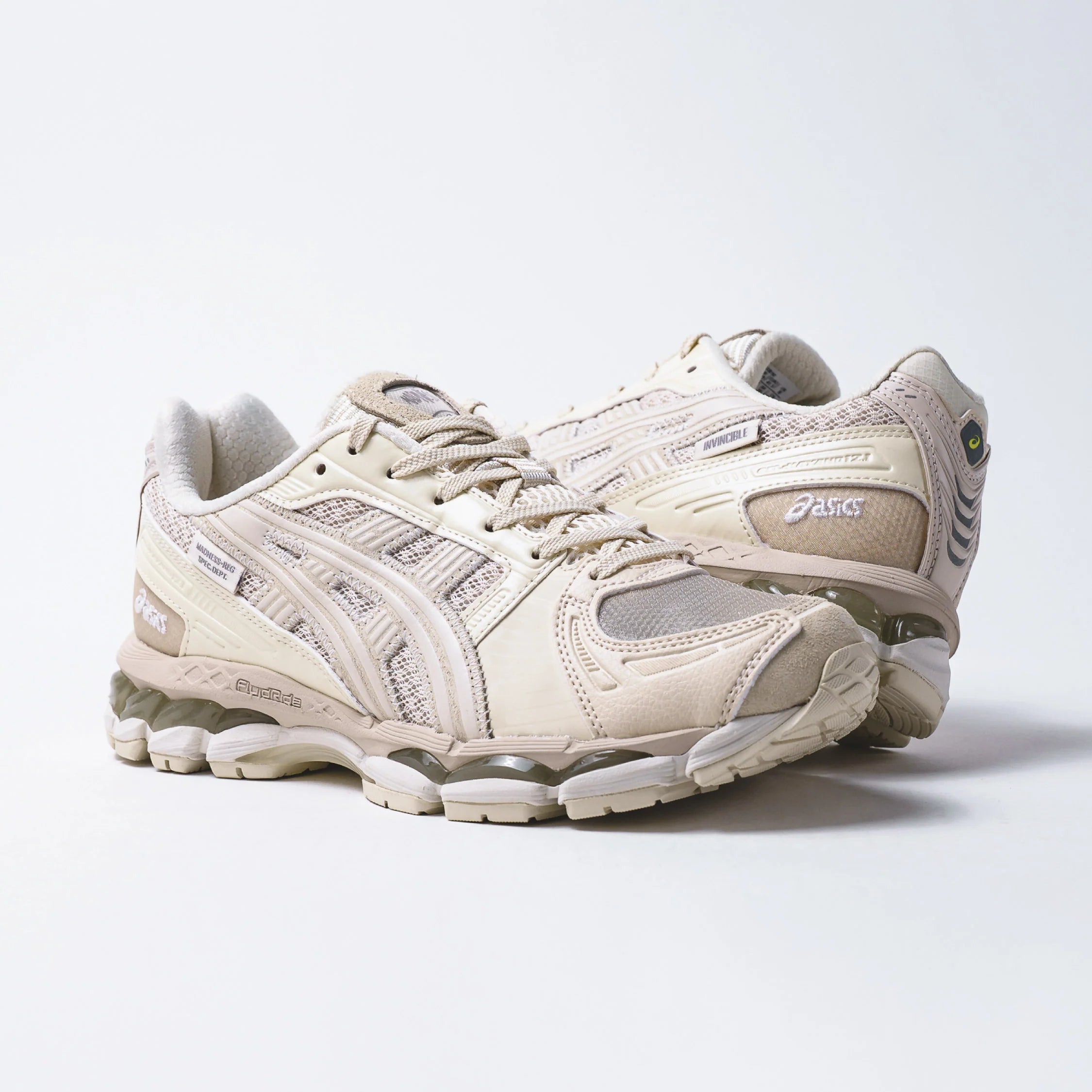 Madness x Invincible x Asics Gel-Kayano 12.1 Vanilla sneakers in beige, showcasing stylish design and comfort.