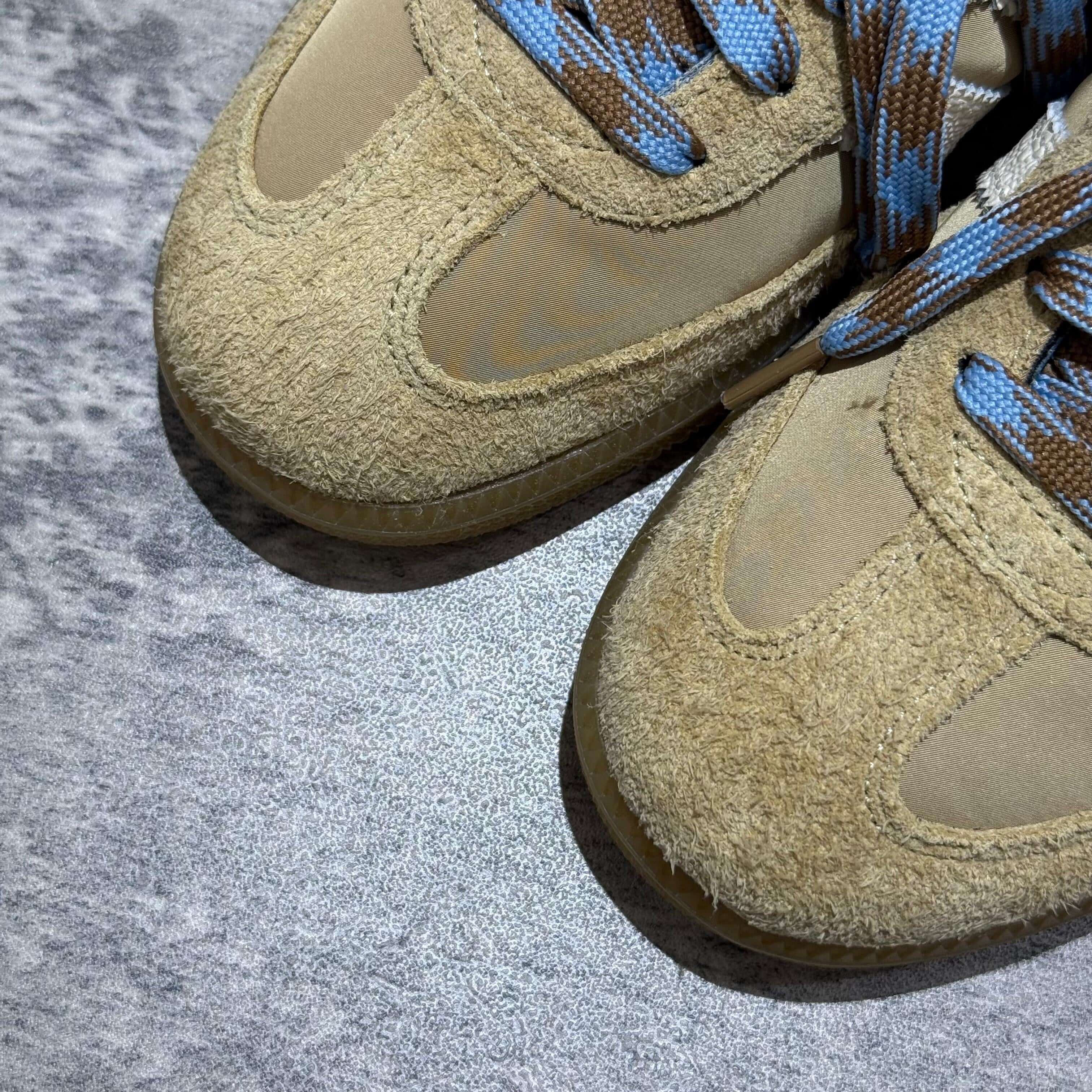 Wales Bonner x Adidas Originals Samba Nylon - Desert White close-up view of shoes with textured tan upper and blue laces.