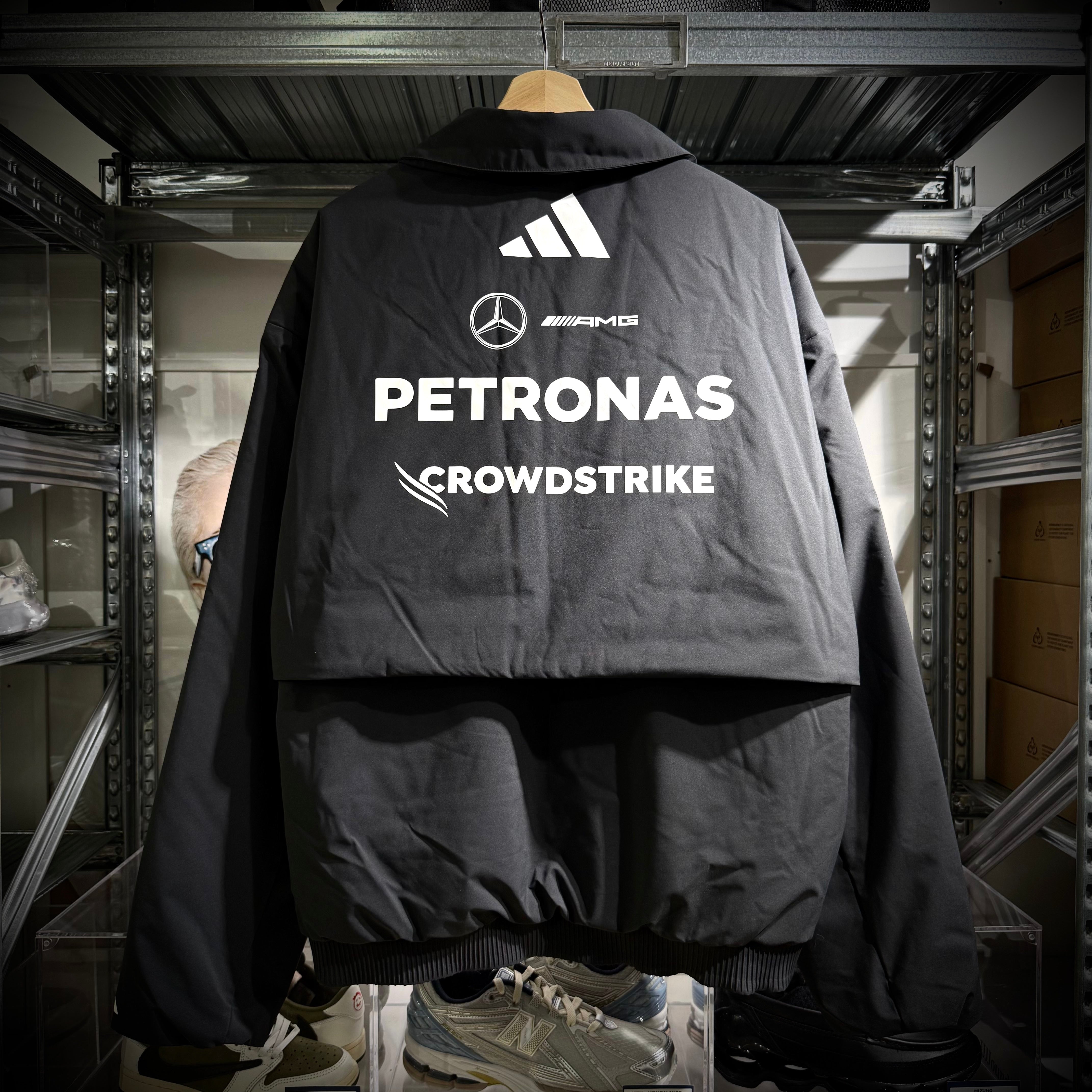Adidas x Mercedes AMG Petronas 2025 F1 Team Jacket JX0748 featuring logos from Crowdstrike and Mercedes.