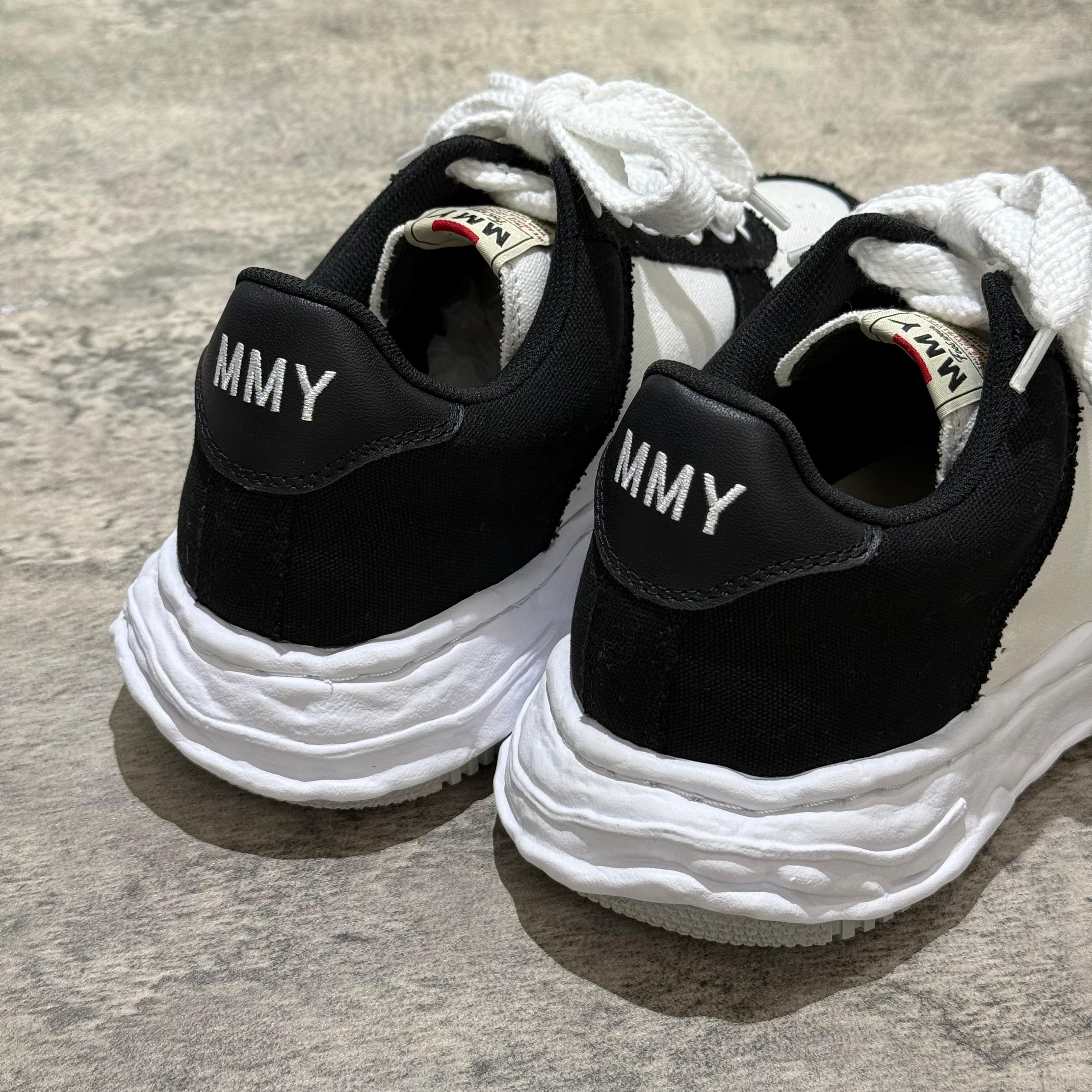 MMY WAYNE OG Canvas black and white sneakers showing heel detail with MMY logo.