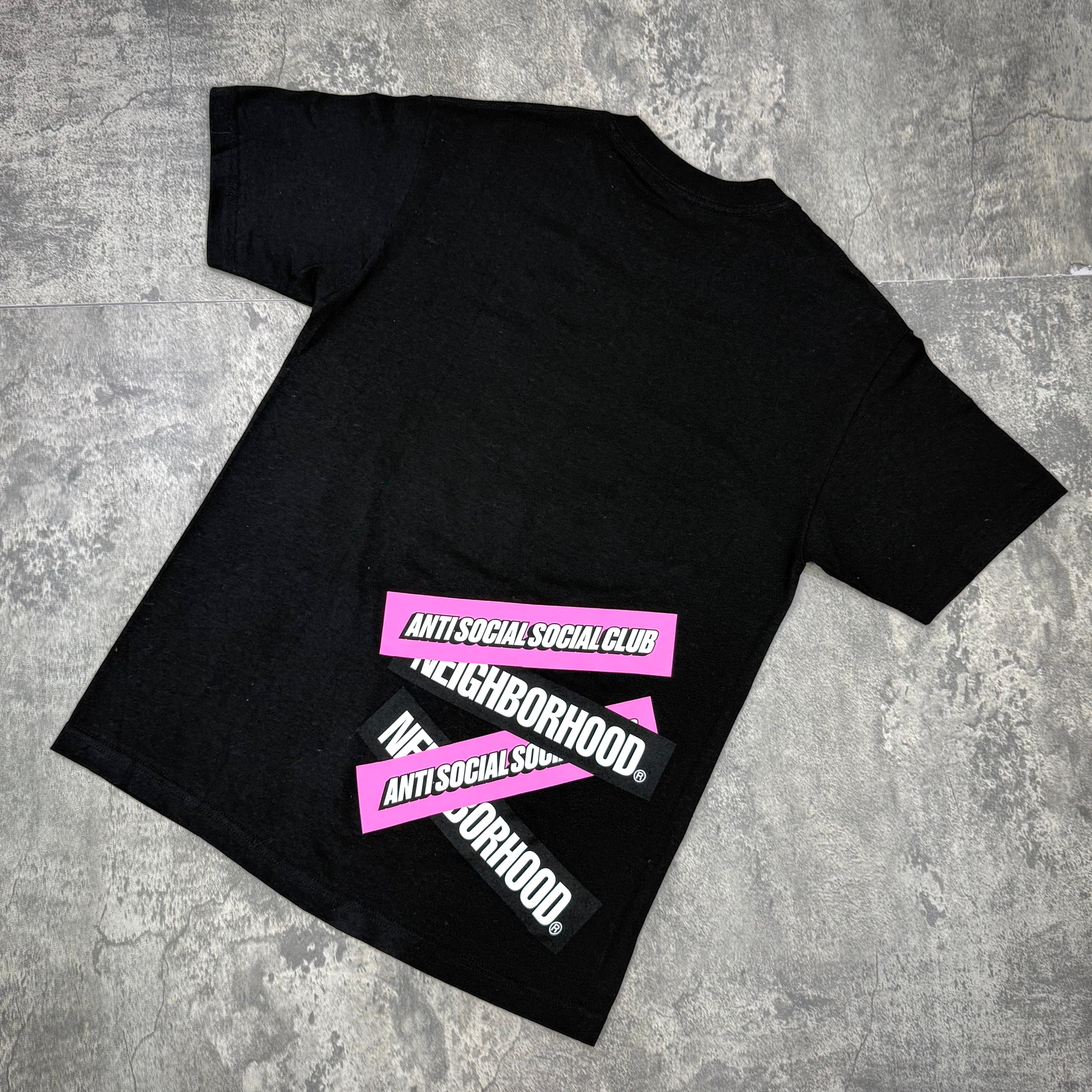 ASSC x Neighborhood Stuck On You Tee - Black / White featuring logo graphics on the back, showcasing a stylish streetwear design.