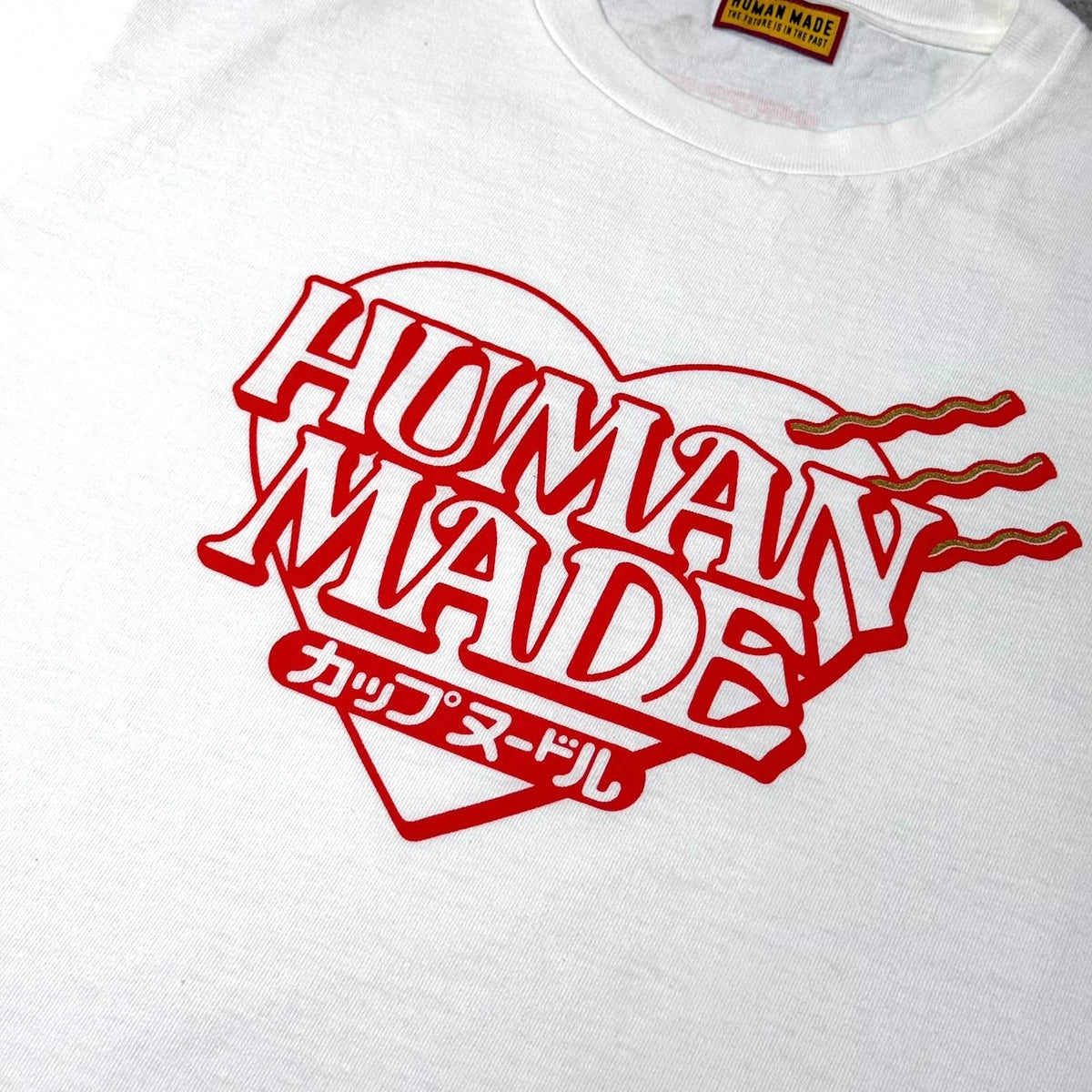 Human Made Cup Noodle Graphic Tee XX32TE002 design featuring red heart logo on white shirt.