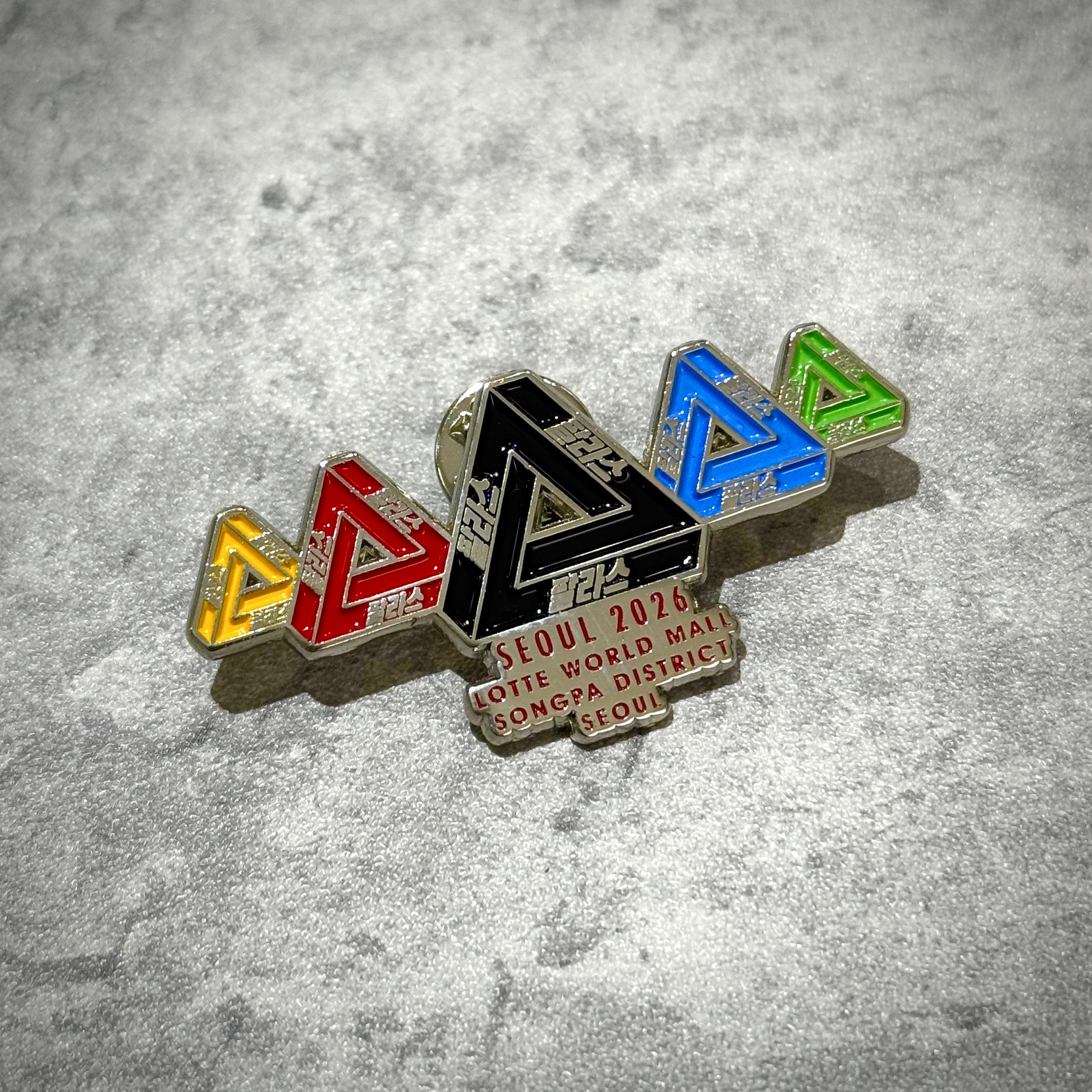 Palace Jamsil Exclusive Accessories pin featuring colorful geometric designs and text for Seoul 2026 event at Lotte World Mall.