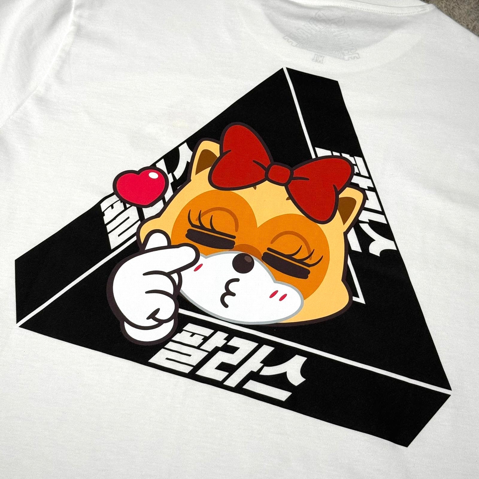 Palace Jamsil Exclusive Lotte Tri-ferg Tee featuring a cartoon dog design with a bow and heart.