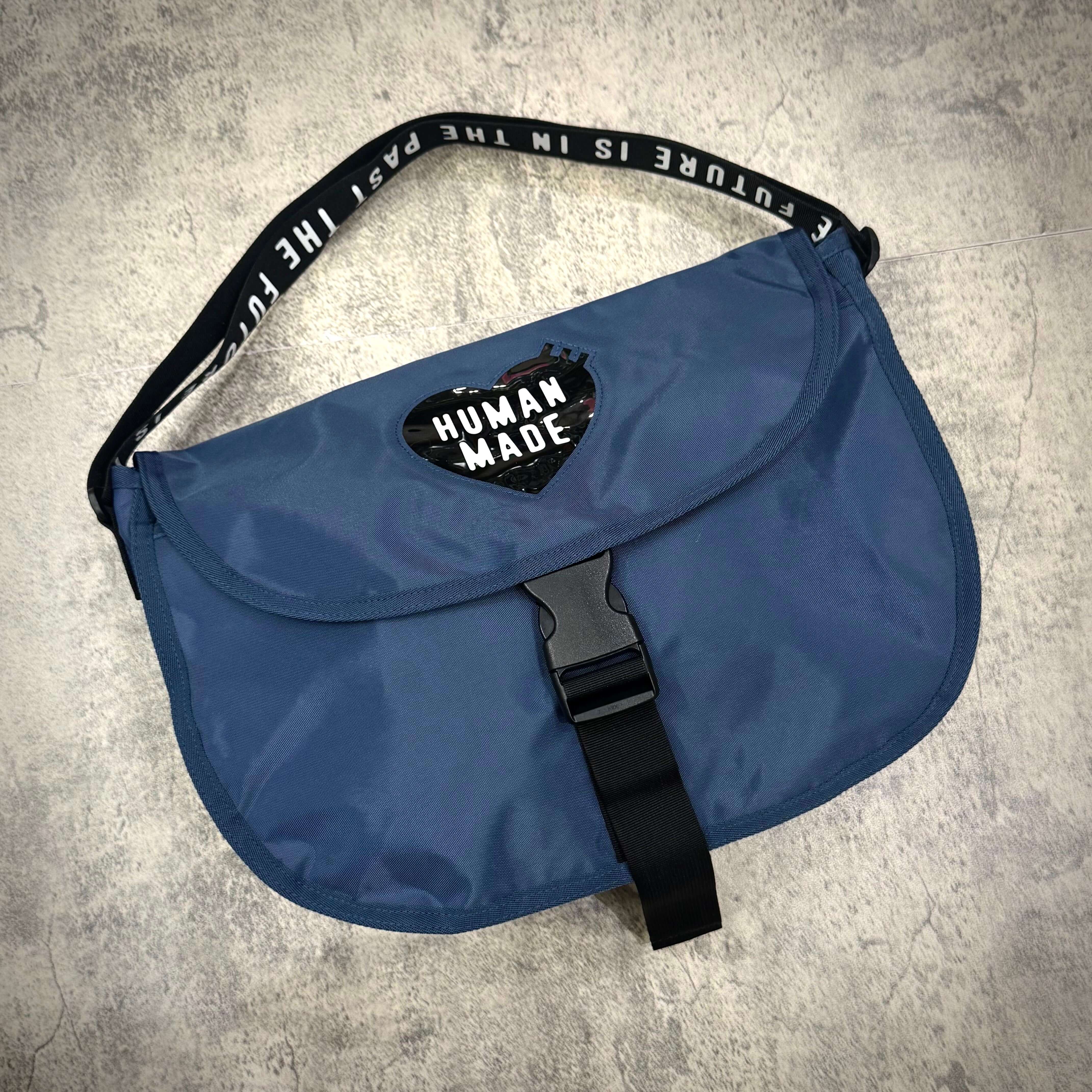 Human Made Nylon Shoulder Bag in blue with adjustable strap and logo