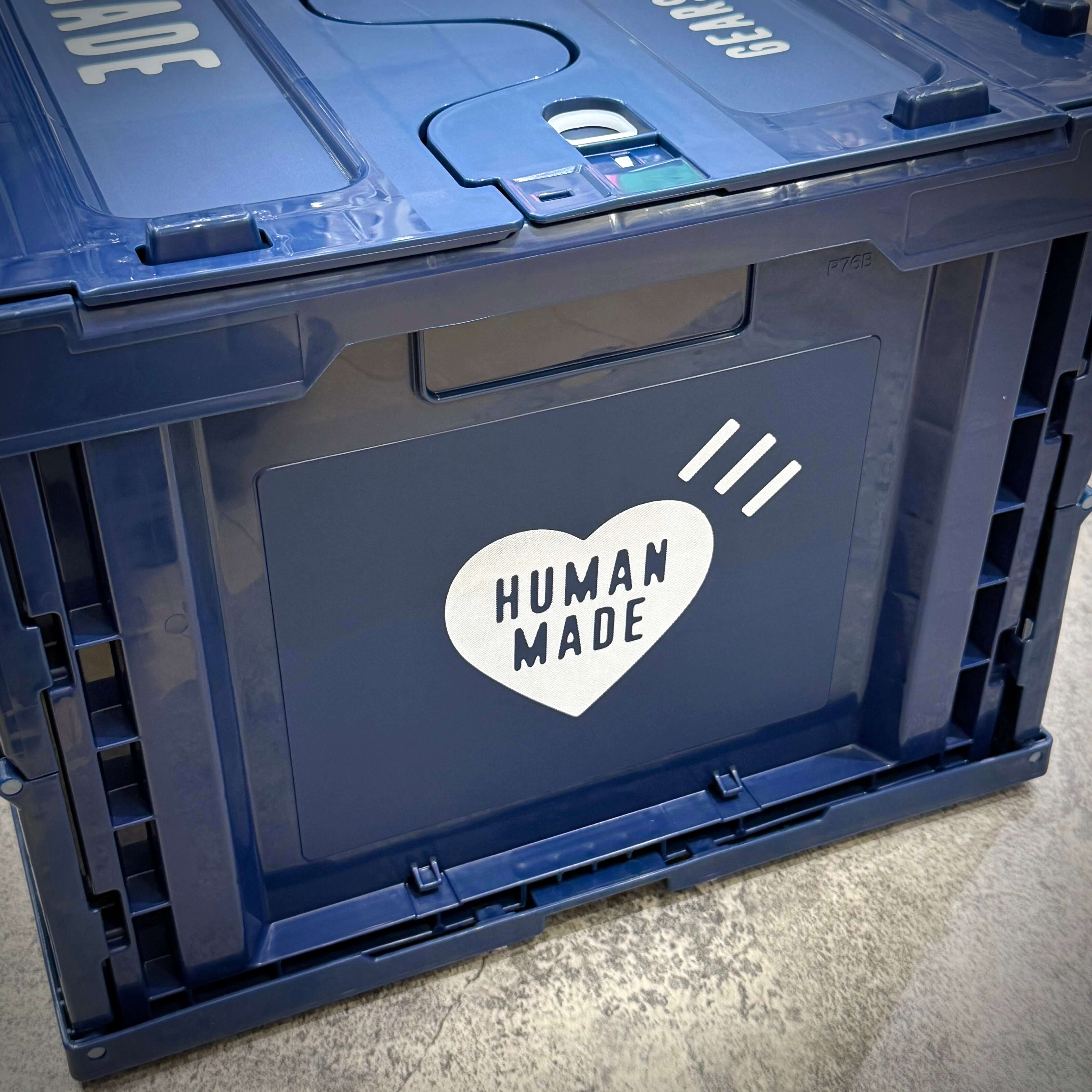 Human Made Container featuring a blue design with a heart logo and the words 'HUMAN MADE' printed on the side.