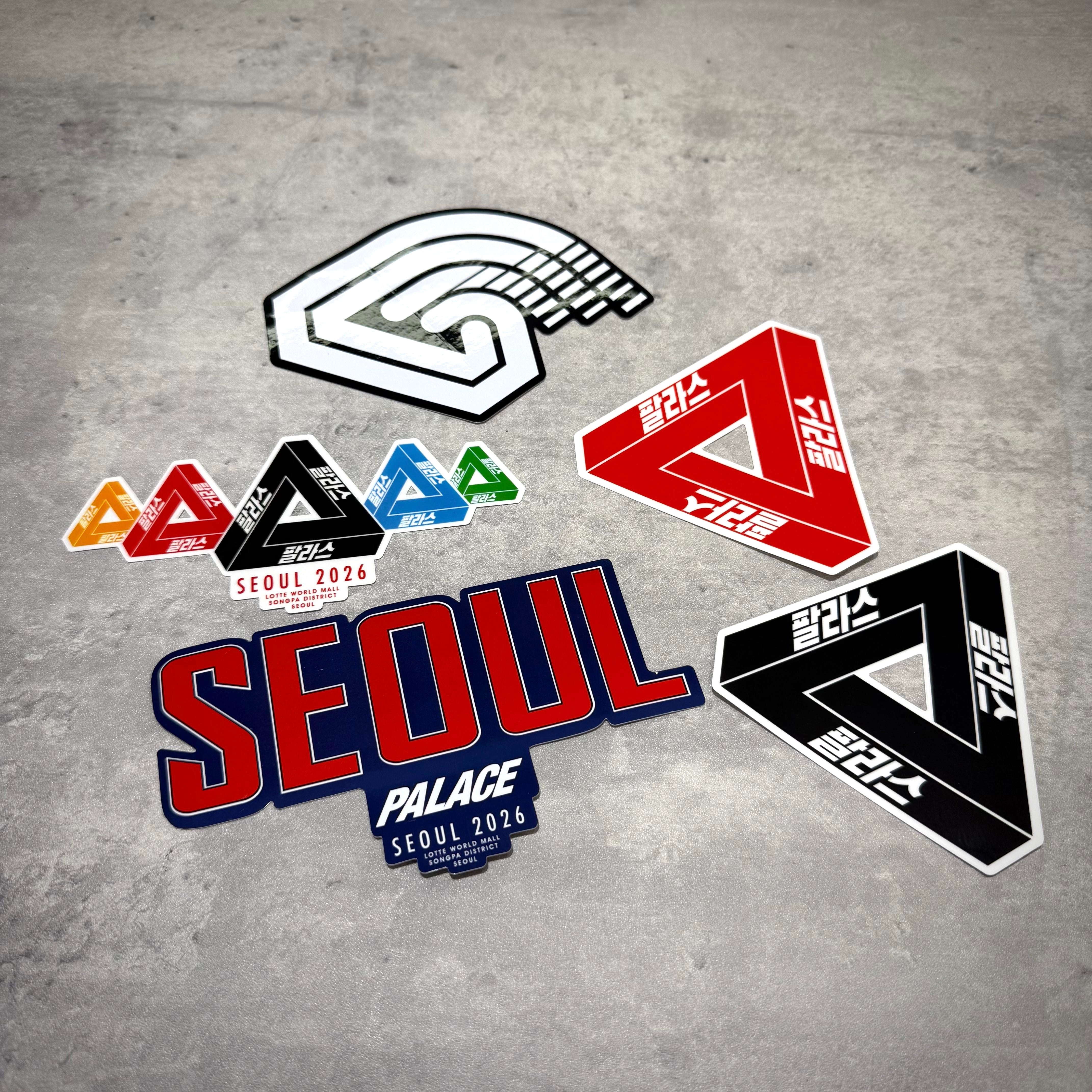 Colorful stickers featuring Palace Jamsil Exclusive Accessories and Seoul 2026 branding on a gray background.