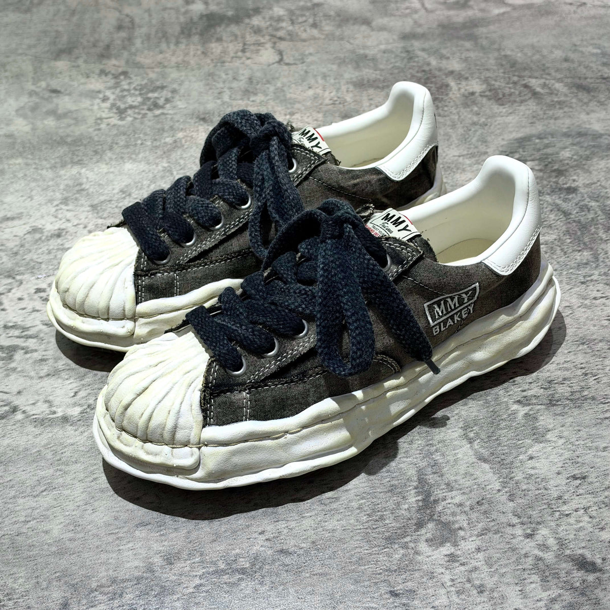 MMY Blakey Bleached Canvas Low - Black A17FW731 shoes with dark laces and unique sole design.