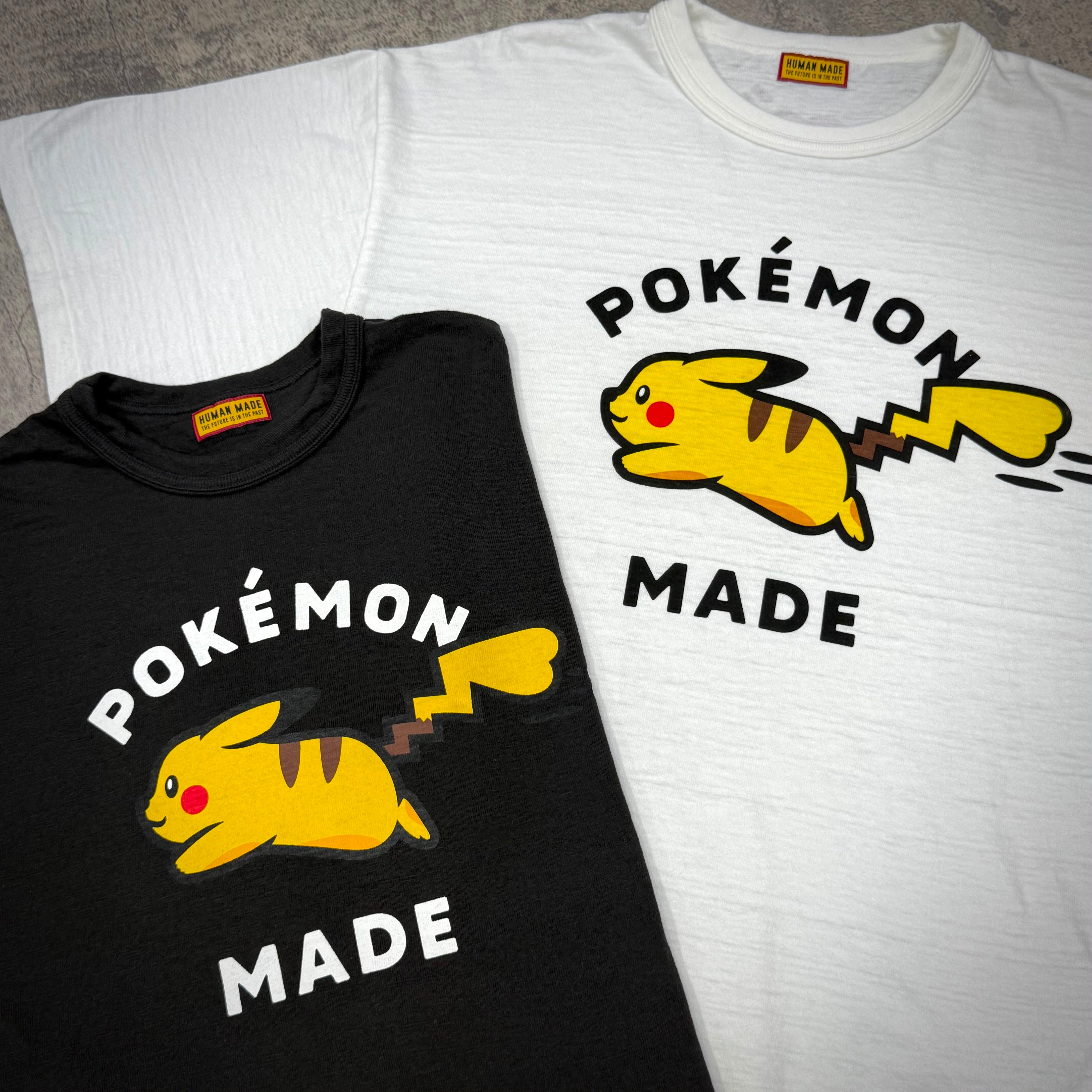 Human Made x Pokemon Graphic Tee featuring Pikachu on black and white shirts.