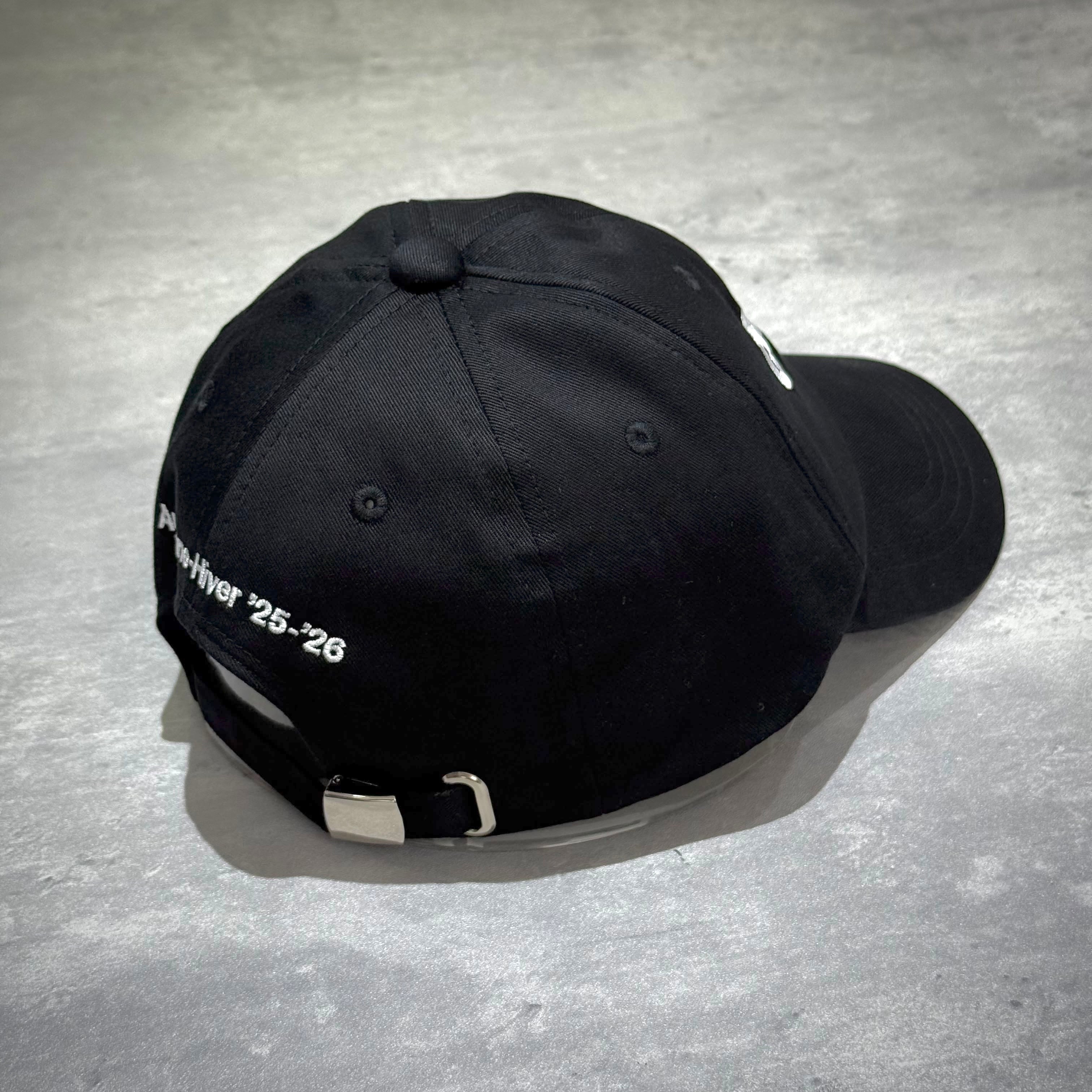 CDG x G-DRAGON Ubermensch Classic Cap showcasing the back view with embroidered details, perfect for urban fashion.