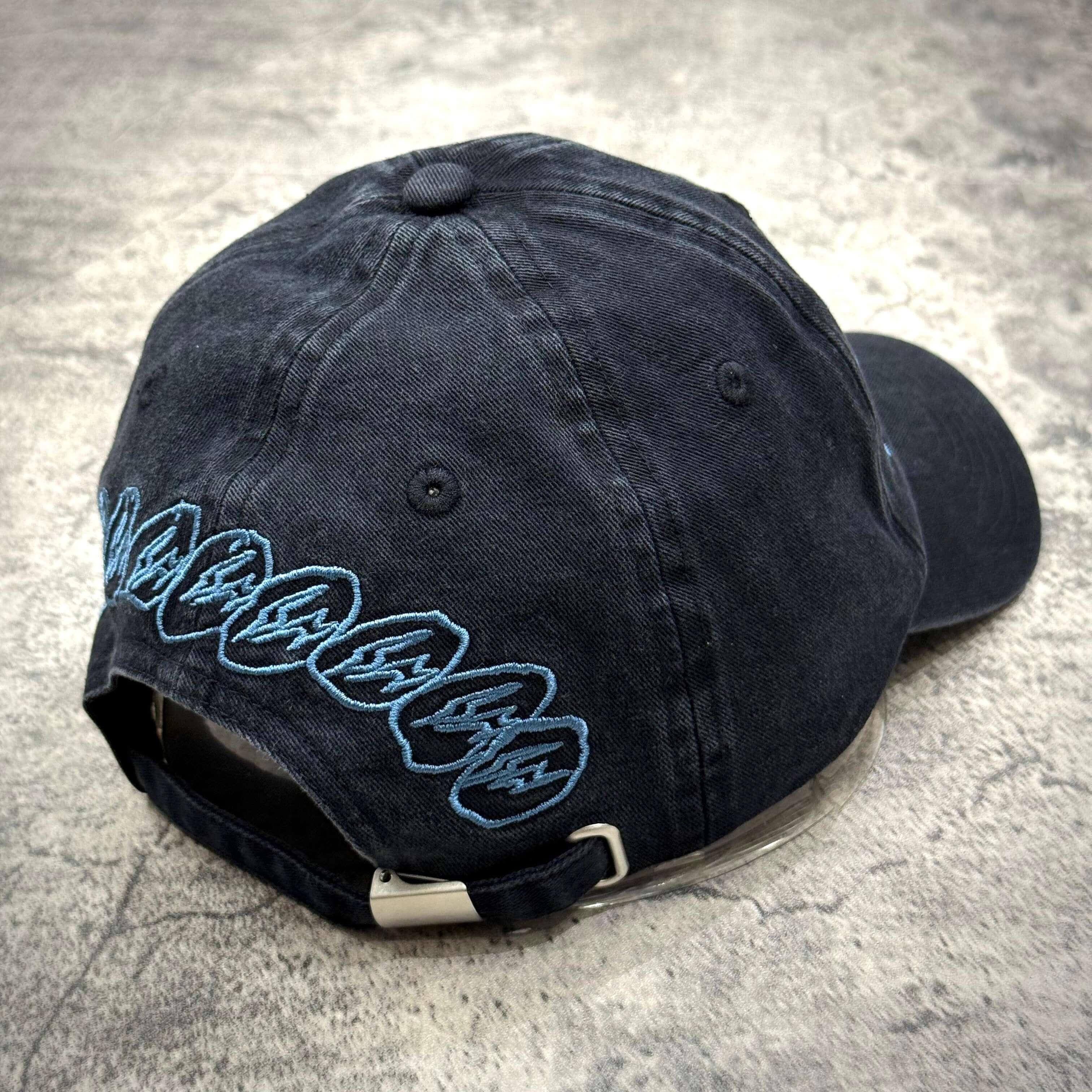 Back view of the Cactus Jack x Fragment x Nike Houston to Ise Mie Hat showcasing the unique embroidery design.