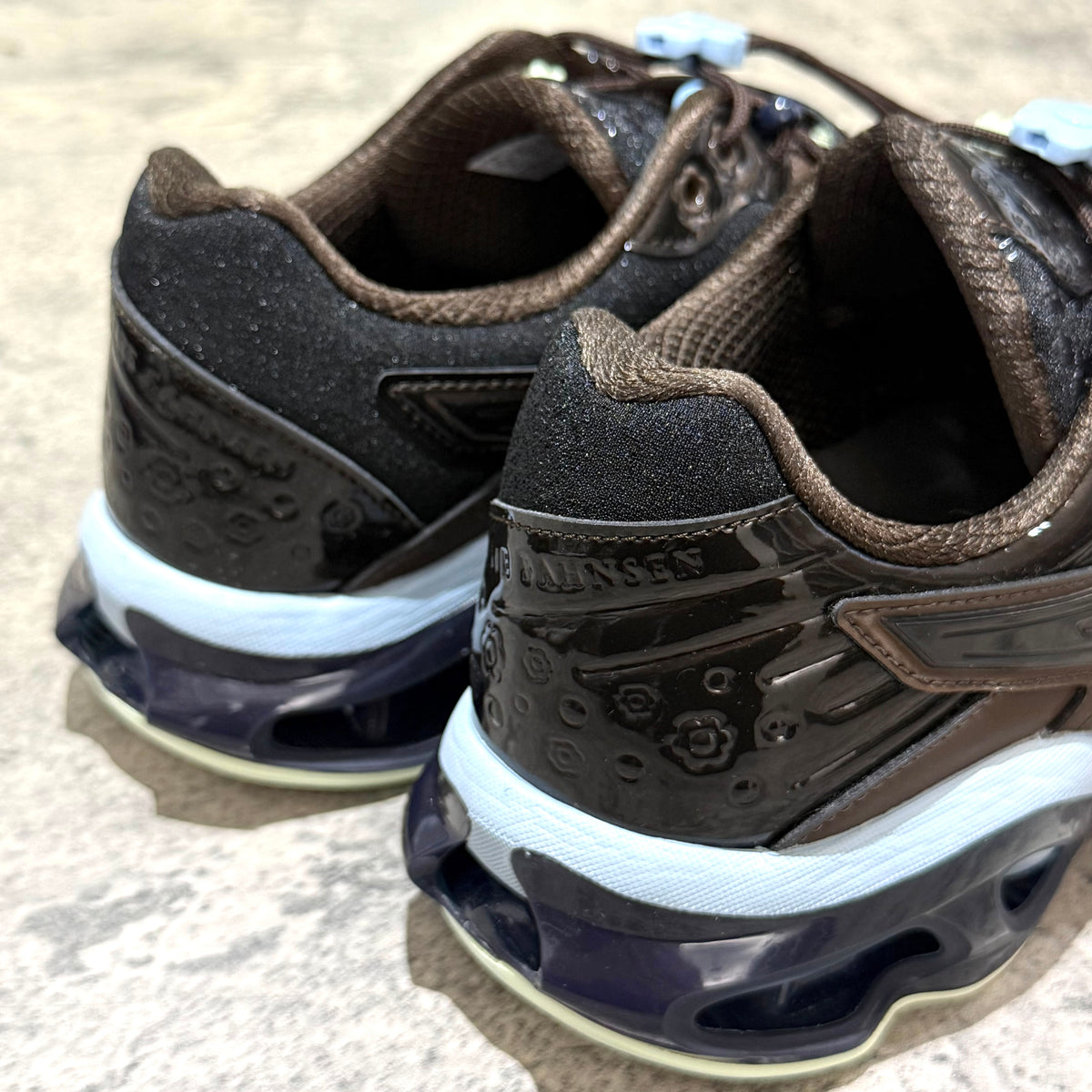 Cecilie Bahnsen x Asics Gel-Kinetic FR - Black Coffee 1203B171-001 close-up view of the heel and outsole features.
