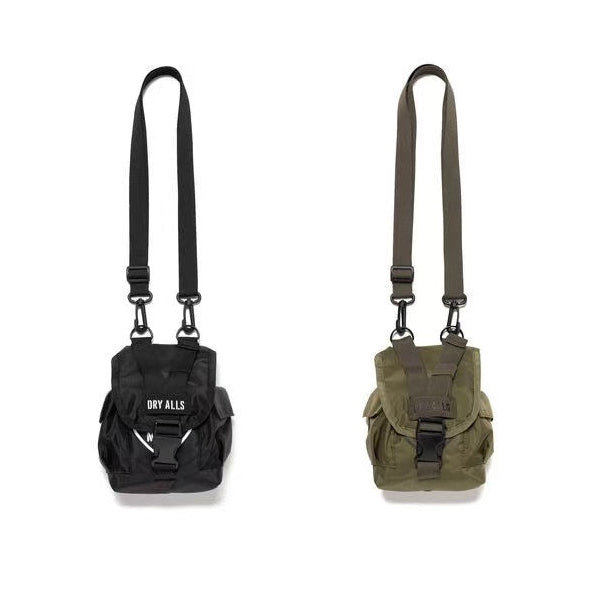 Human Made Military Multi Pouch in black and olive green, showcasing its versatile design and adjustable straps.
