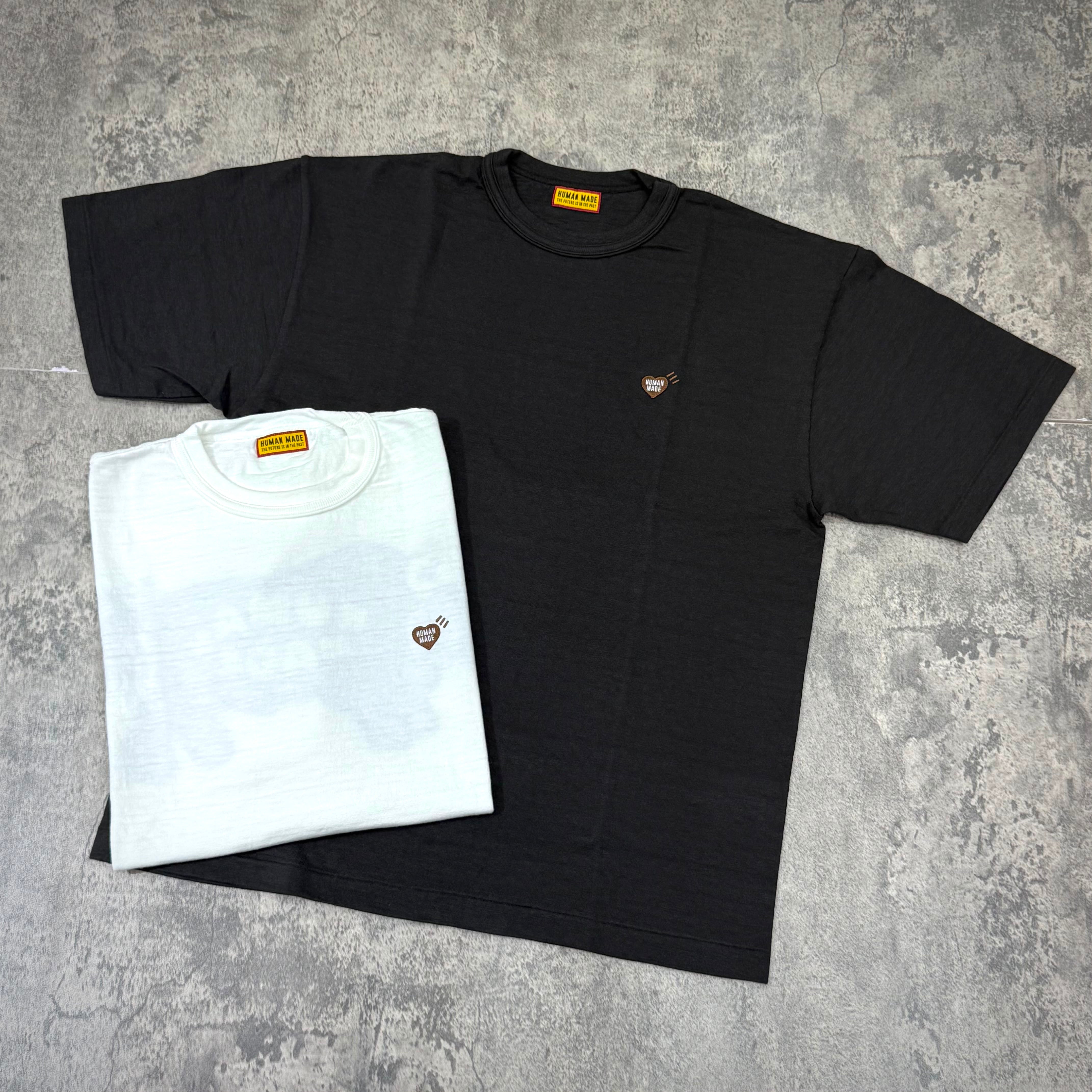Human Made Kobe Exclusive Bull Back Logo Tee in black and white, featuring the Bull Back logo on each.