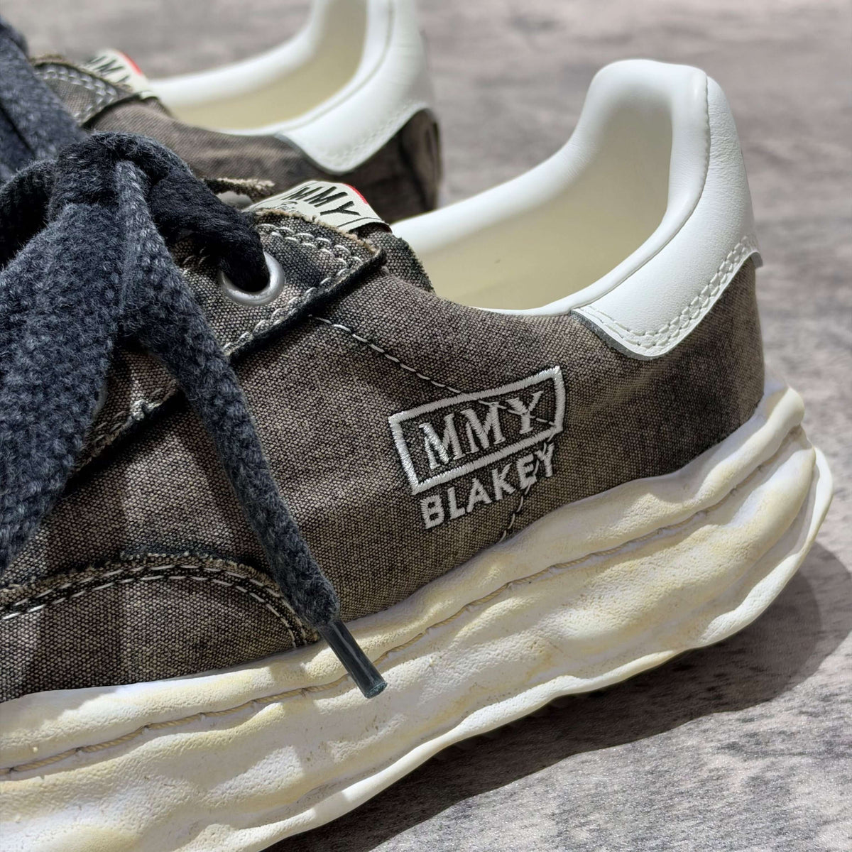 MMY Blakey Bleached Canvas Low - Black A17FW731 with textured upper and white accents.