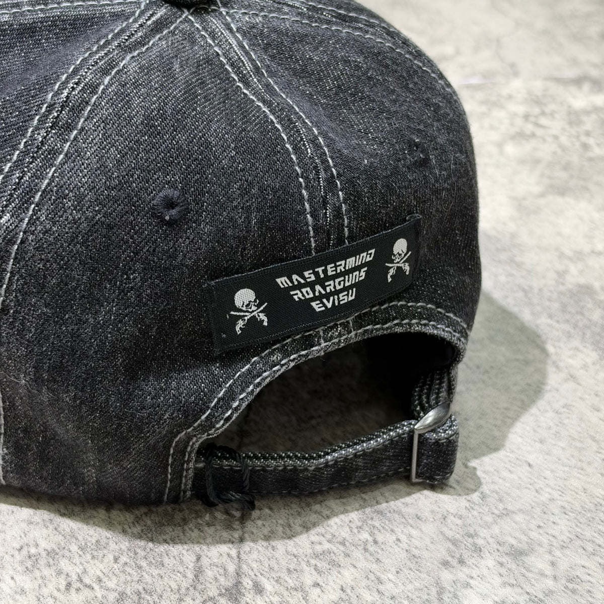Evisu x Mastermind Japan x Roarguns Cap, showcasing the back design with branding details.