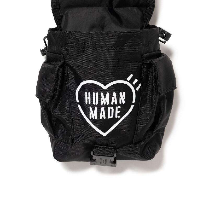 Human Made Military Multi Pouch with heart logo on black fabric background.