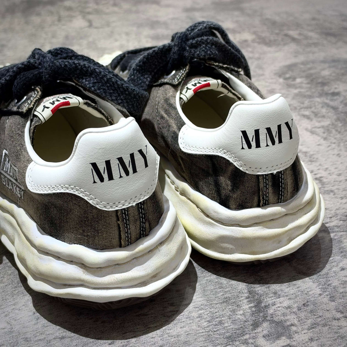 MMY Blakey Bleached Canvas Low - Black shoes featuring unique design and branding on the back.