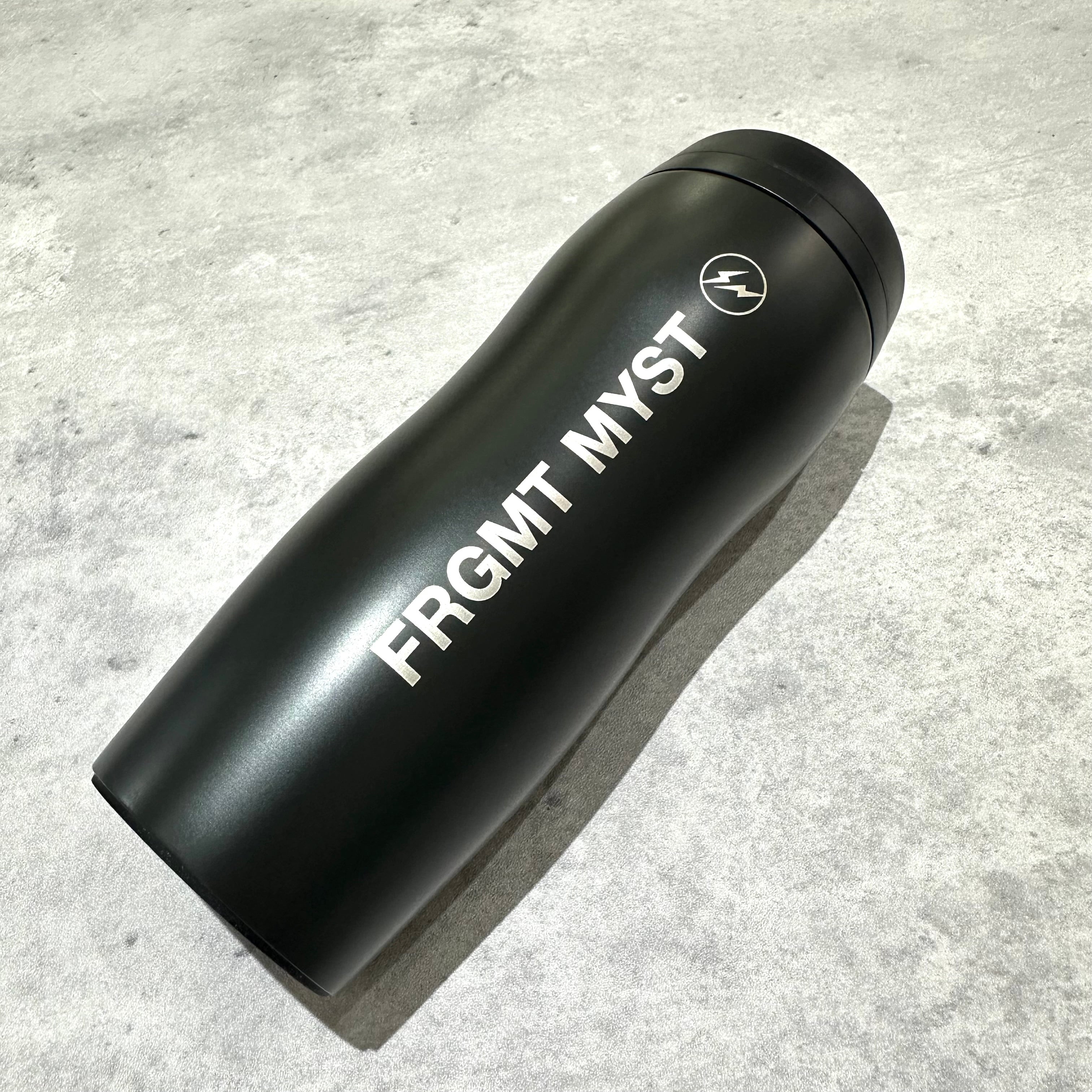 FRGMT MYST x STARBUCKS Curved Stainless Bottle in black, showcasing sleek design and logo.