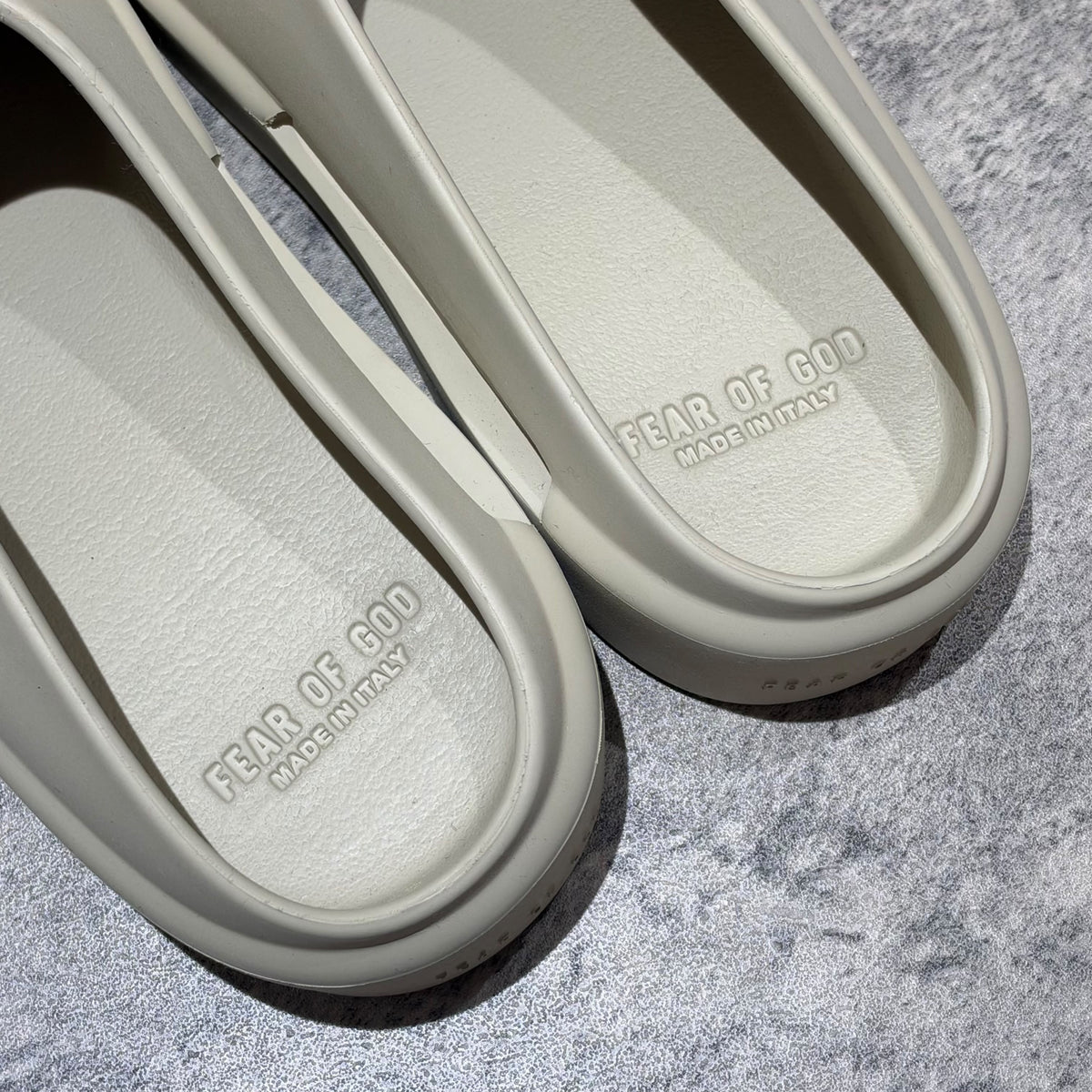 Fear of God The California Slip-on Oat FG80-100EVA footwear featuring minimalist design and embossed branding details.