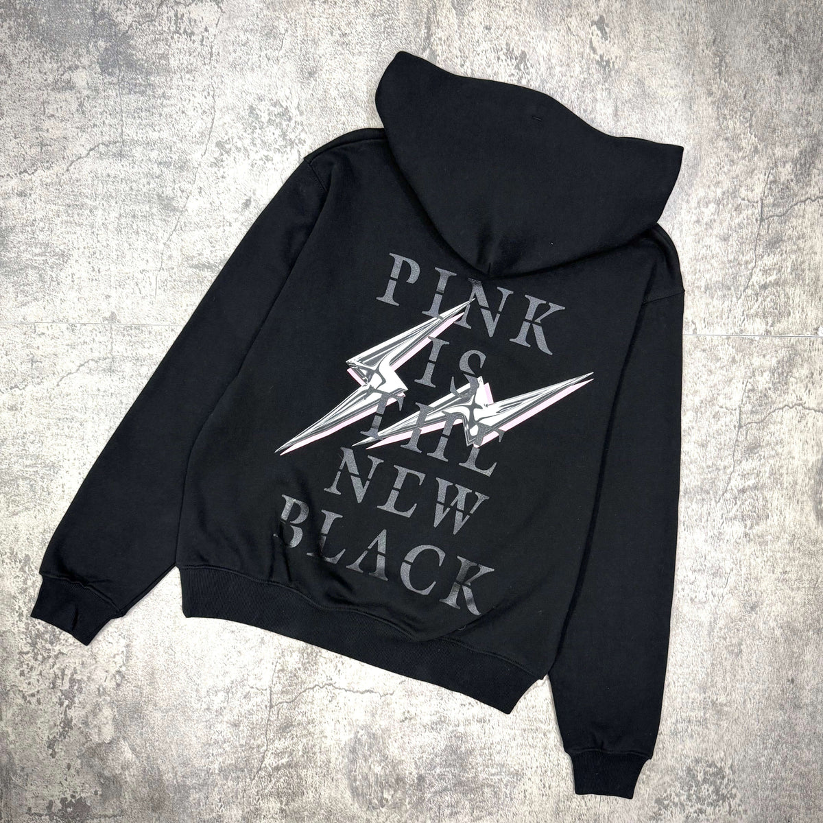 Fragment x Blackpink Thunder Hoodie featuring bold text "PINK IS THE NEW BLACK" on the back.