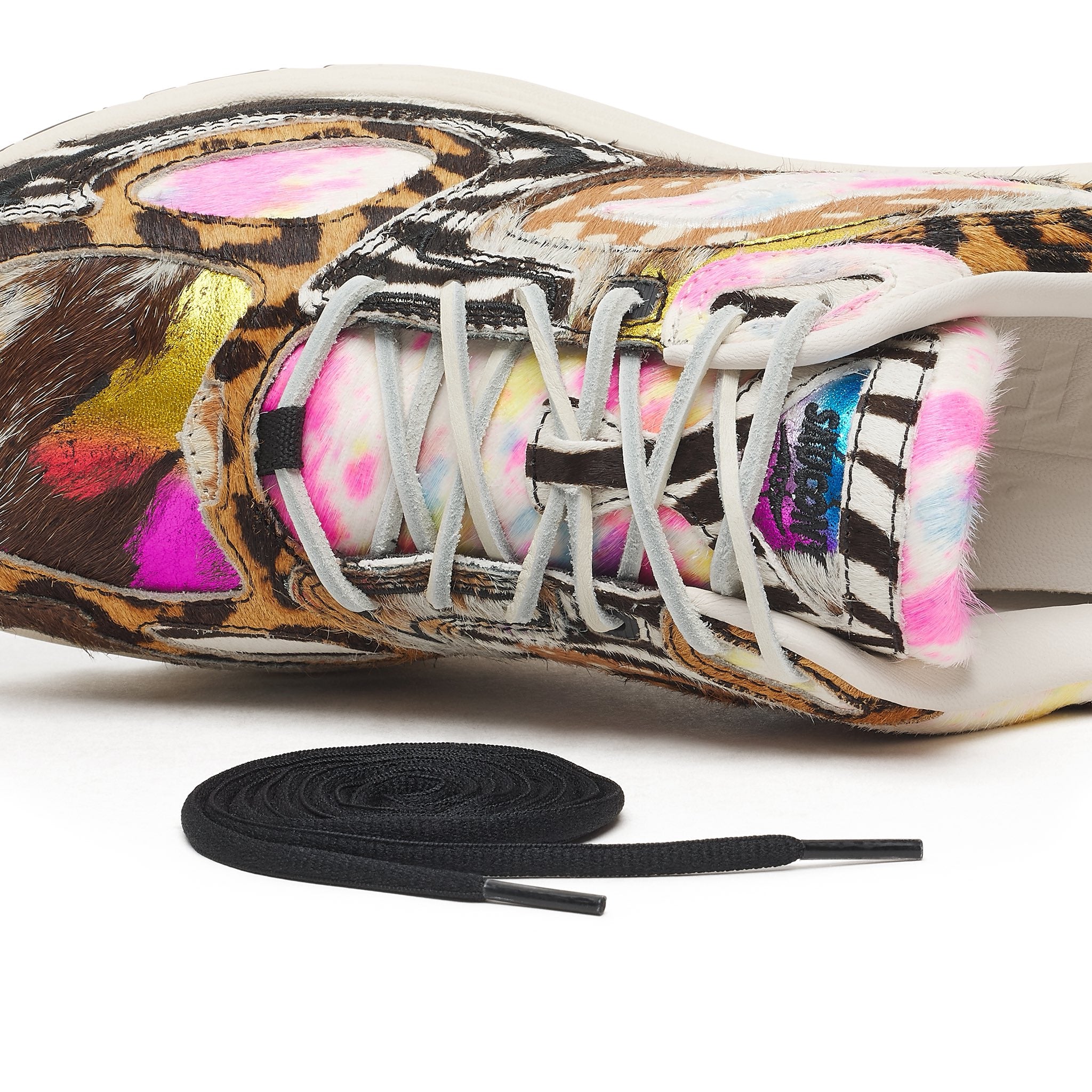 Saucony x Westside Gunn Grid Jazz 9 Awesome God close-up with colorful pattern and black laces.