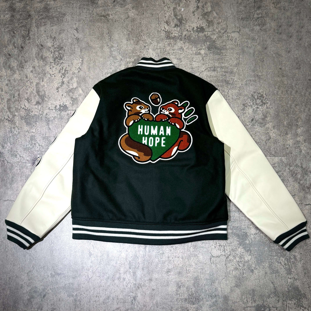 HUMAN HOPE Varsity Jacket HUMAN MADE x j-hope of BTS back view featuring colorful graphic design