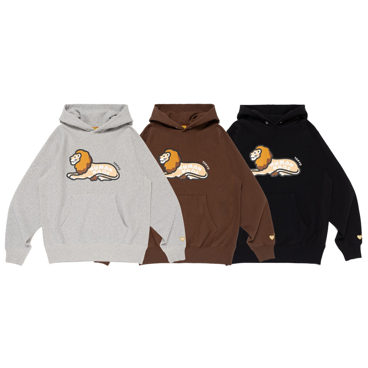 HUMAN MADE TOKYO Flagship Store Collection featuring three hoodies in gray, brown, and black with a lion graphic.