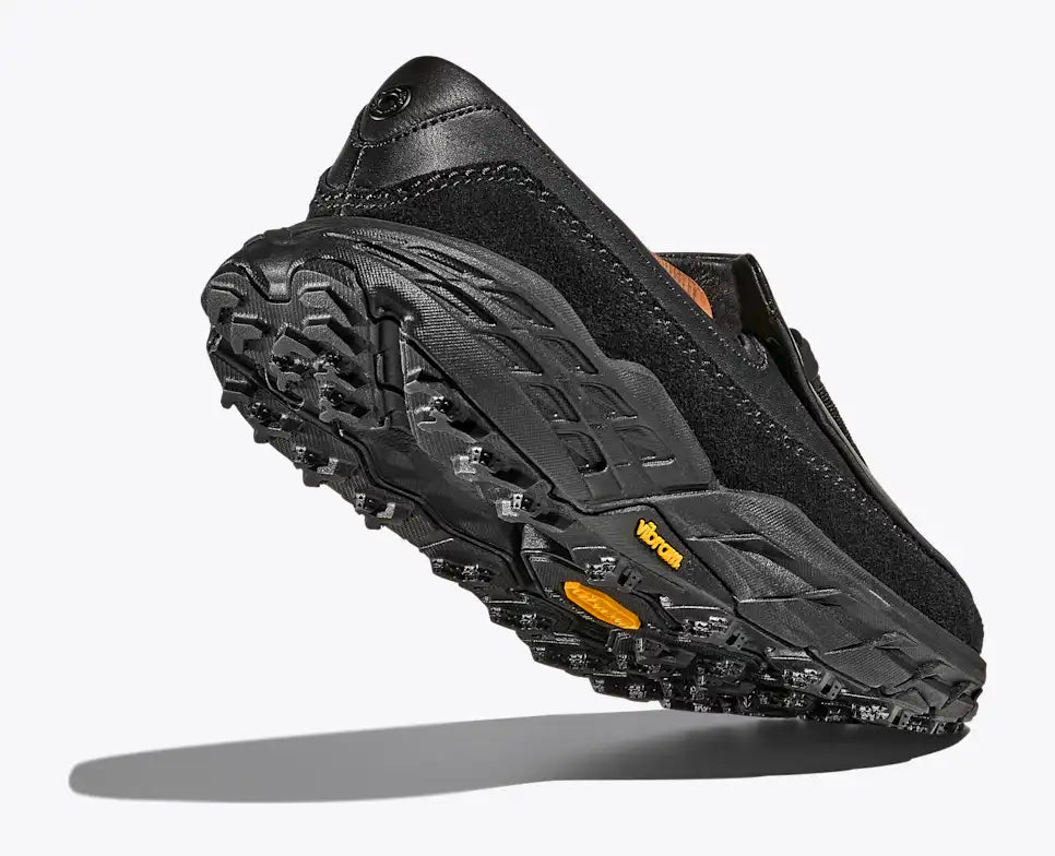 Hoka Speed Loafers - Black 1162170-BBLC showing the shoe's sole and traction design for optimal grip.