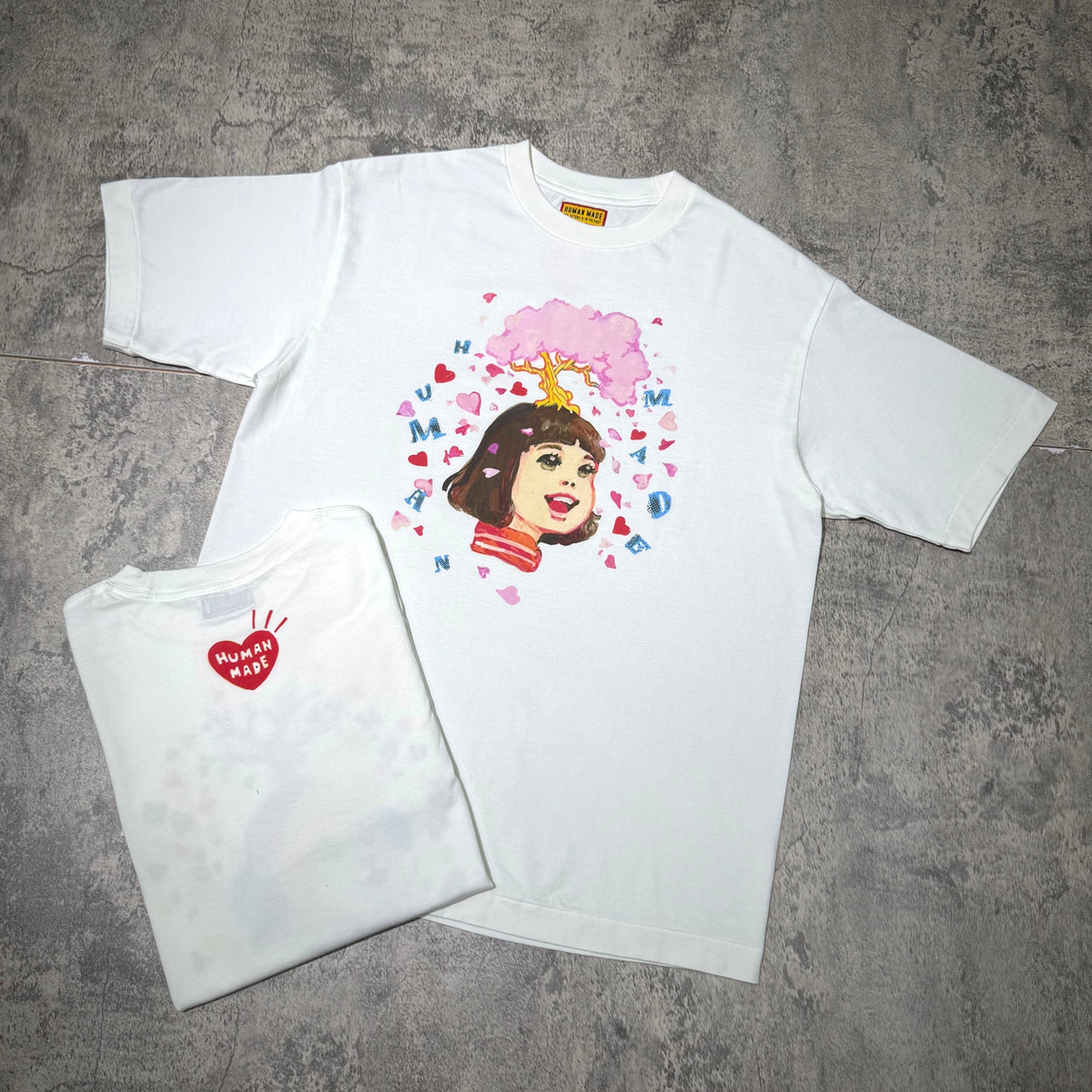 Human Made Keiko Sootome "Can't Stop LOVE!" Tee featuring colorful graphic of a girl with a crown and heart print.