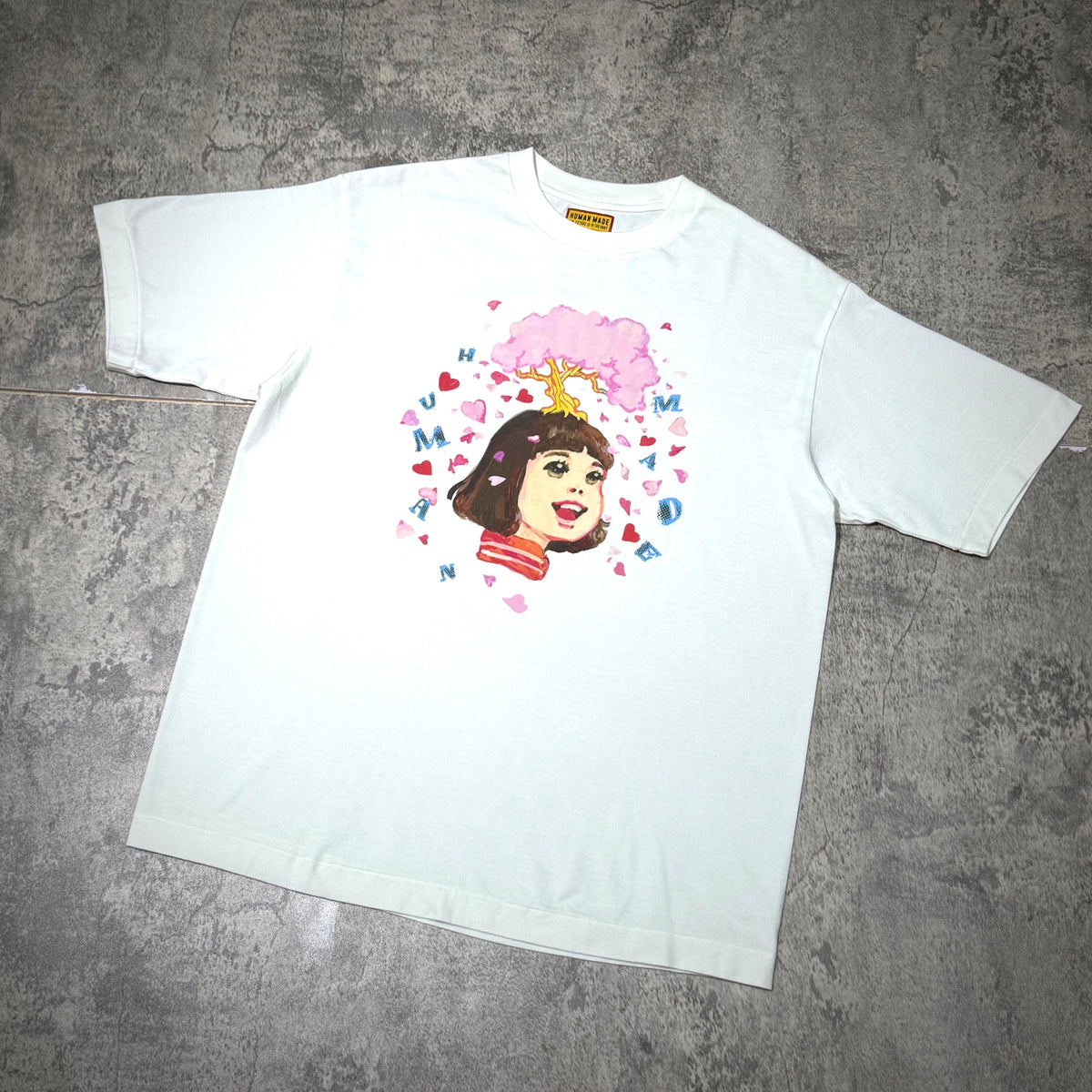 Human Made Keiko Sootome 'Can't Stop LOVE!' Tee featuring colorful graphic design on a light background.