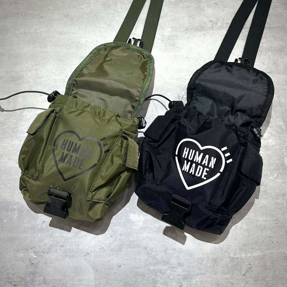 Human Made Military Multi Pouch，綠色與黑色兩款軍事多功能背包，展示內部結構與設計。