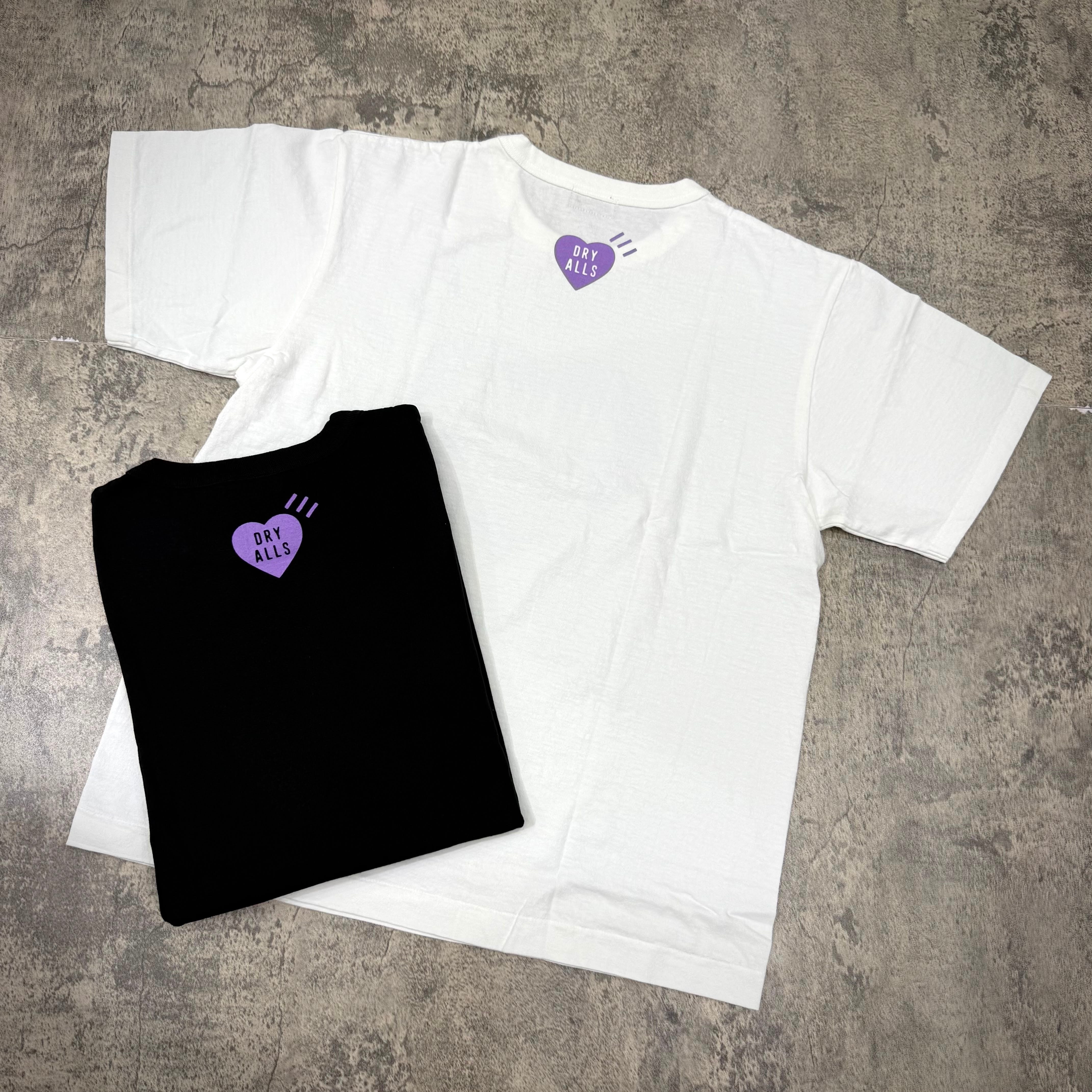 Human Made Apgujeong Exclusive Heart Logo Tee in white and black colors with heart logo on the chest.