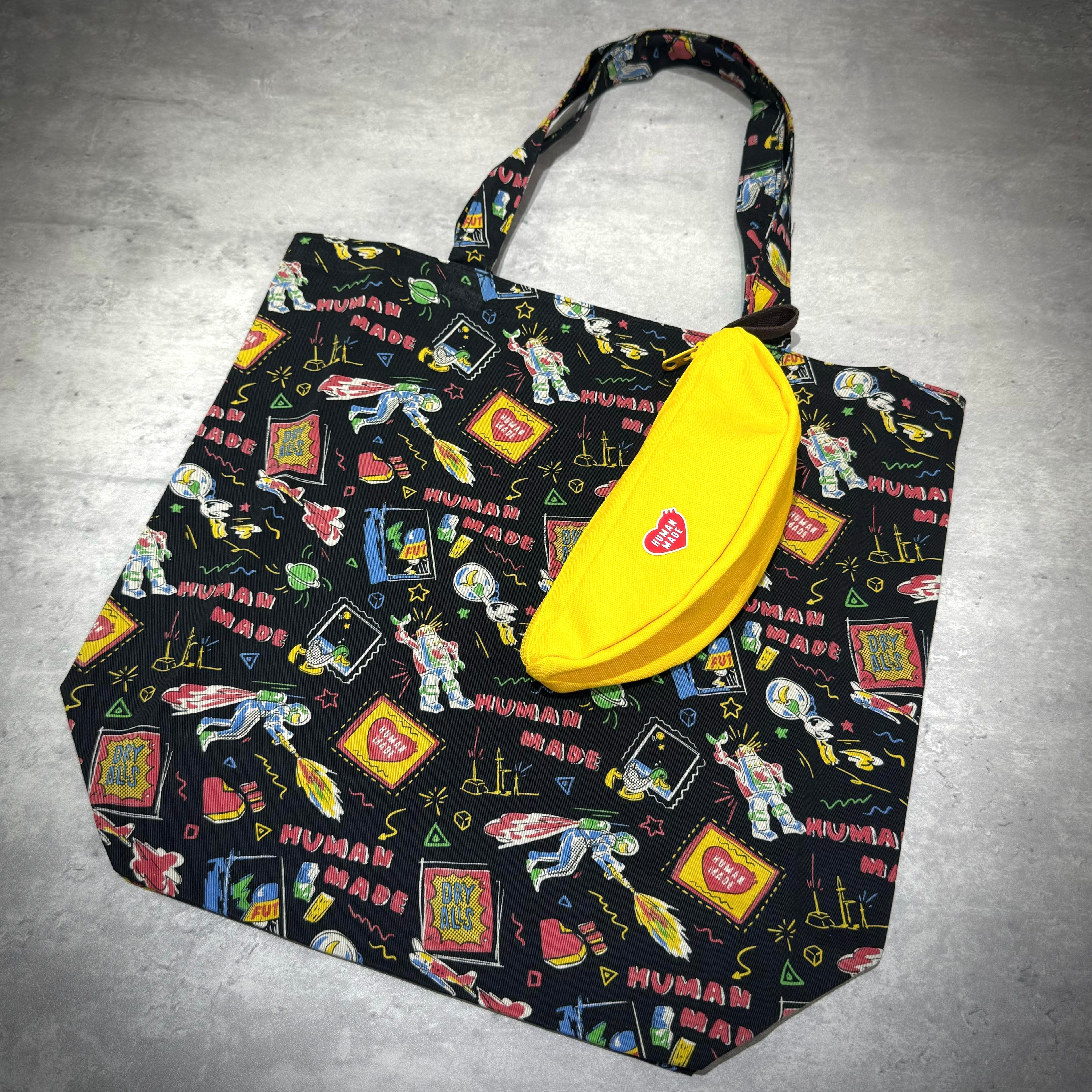 Human Made Banana Pouch in yellow, featured with colorful tote bag design, showcasing authenticity and unique style.