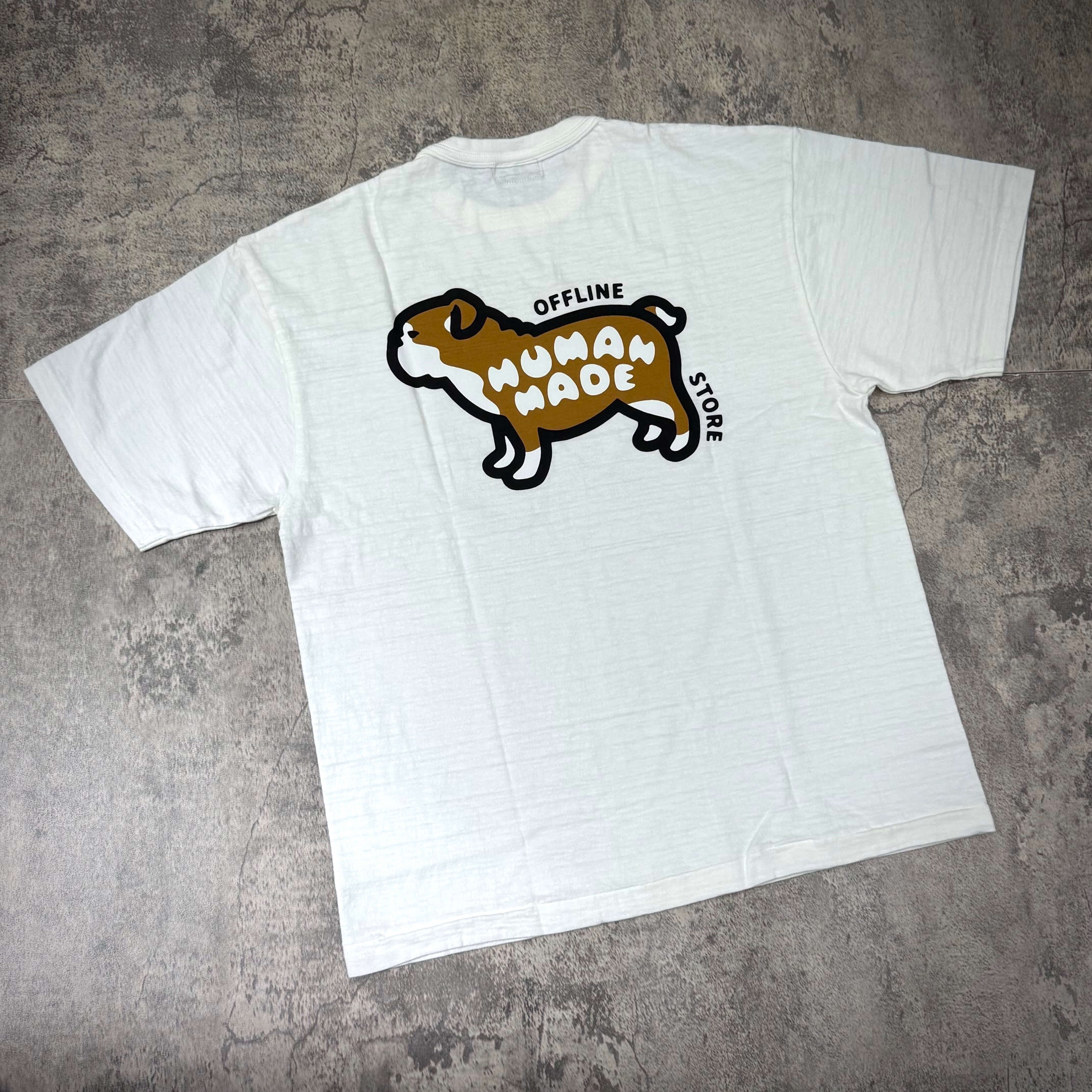 Human Made Gaien offline Exclusive Bull Dog Back Logo Tee featuring a playful dog graphic on the back.