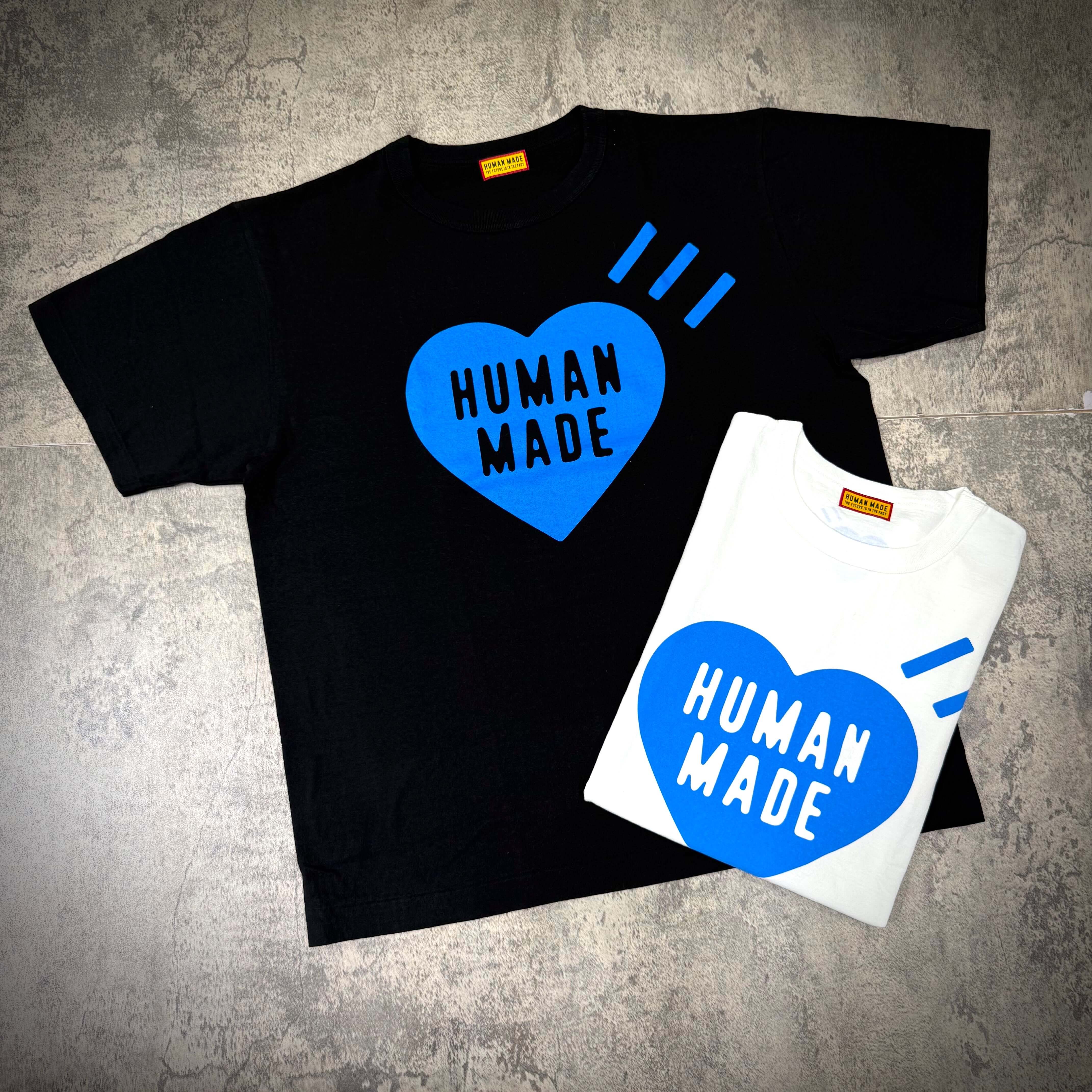 Human Made Gaien offline Exclusive Heart Logo Tee - black and white t-shirts displaying heart logo and brand name.