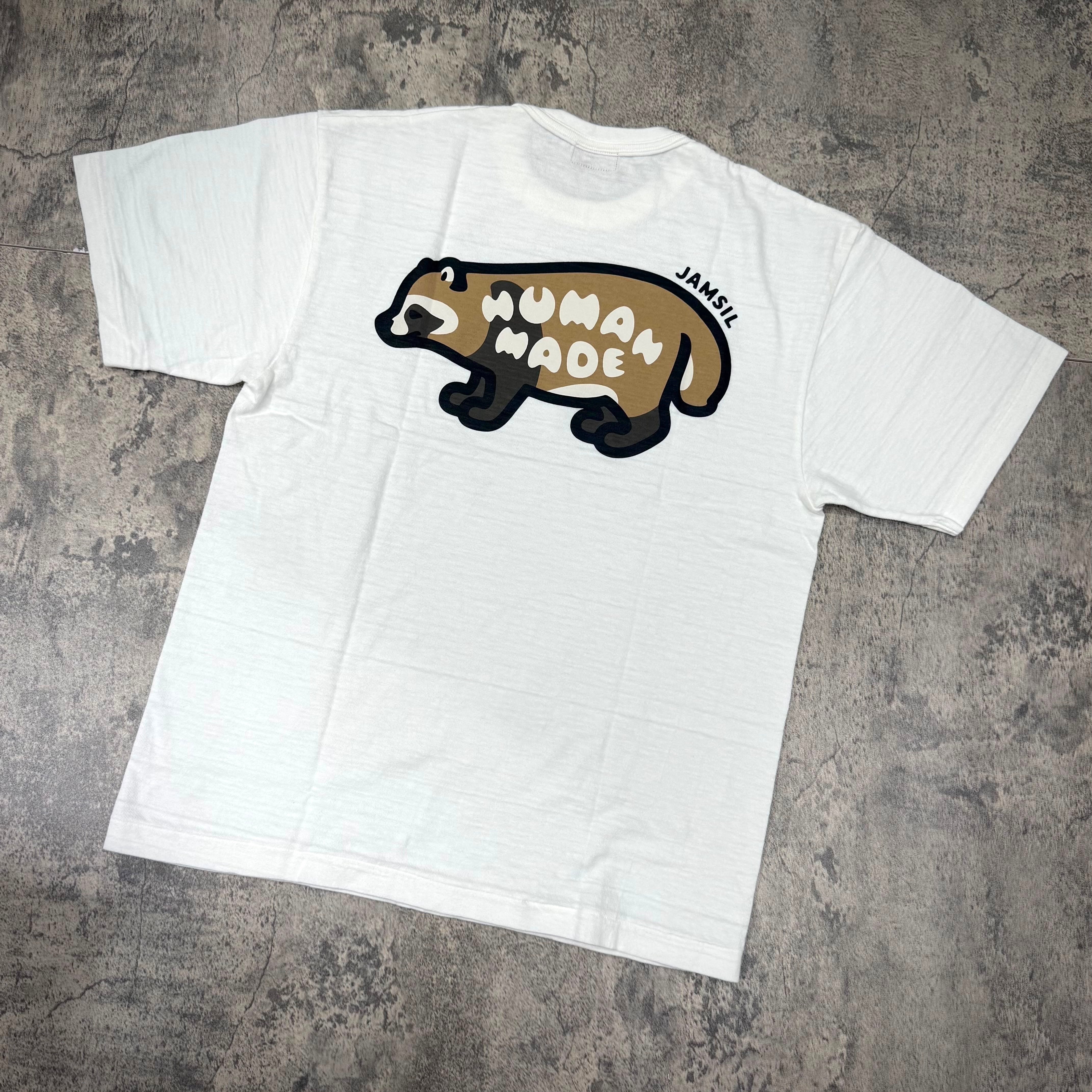 Human Made Jamsil Exclusive Raccon Back Logo Tee featuring a playful raccoon design on a white t-shirt.