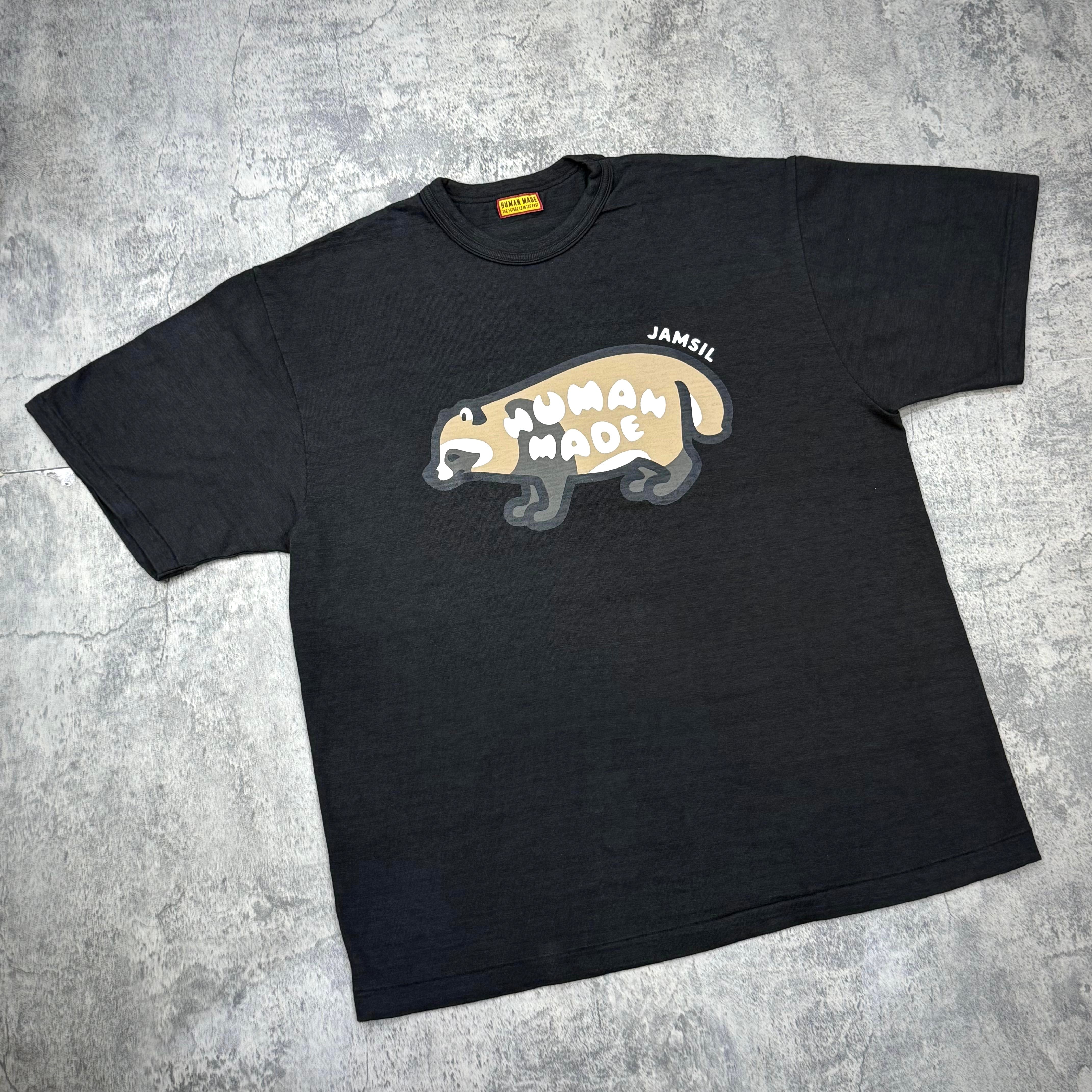 Human Made Jamsil Exclusive Raccon Tee featuring a raccoon graphic design on a black t-shirt.