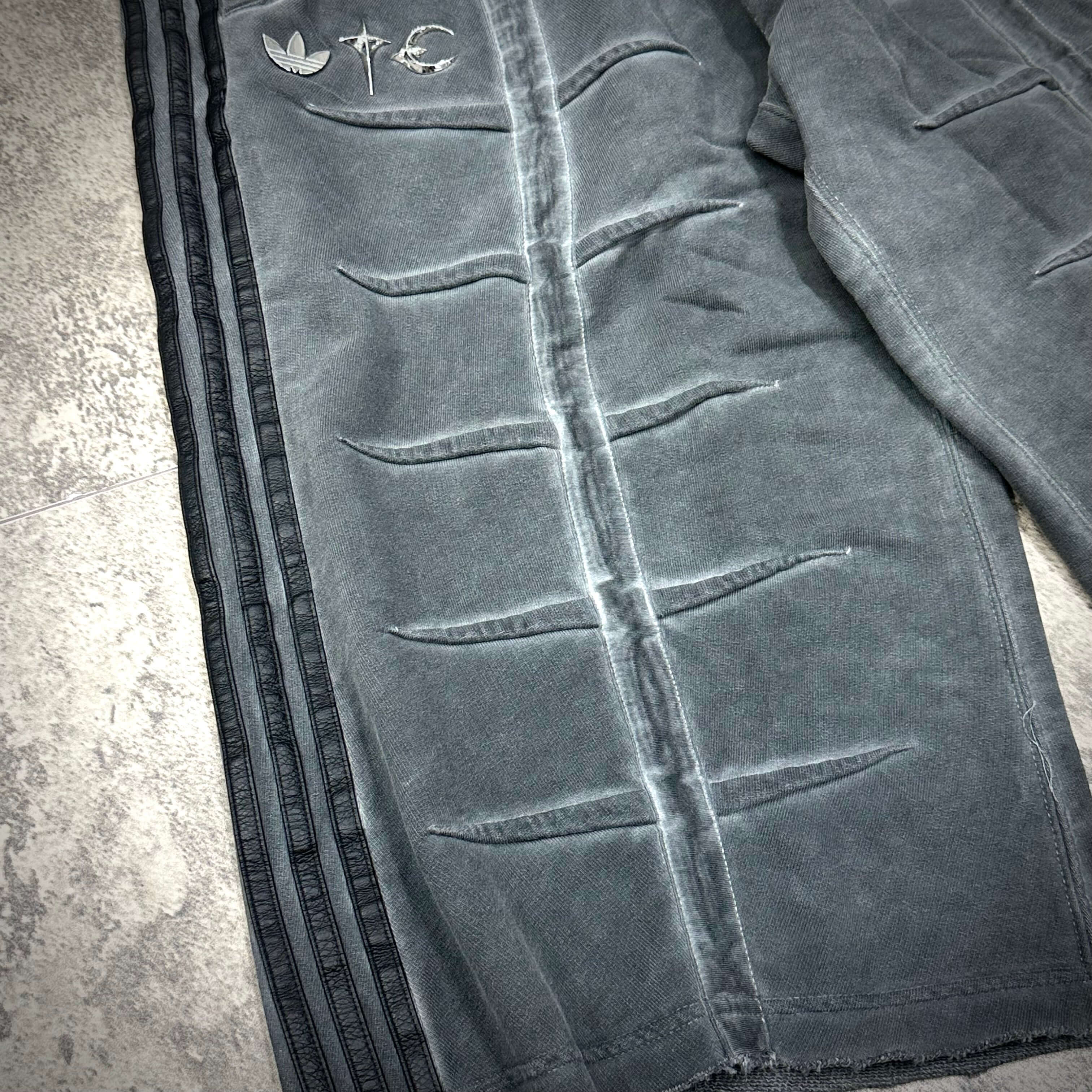 Thug Club x adidas Originals Sweat Jort showing distressed design and three-stripe branding.