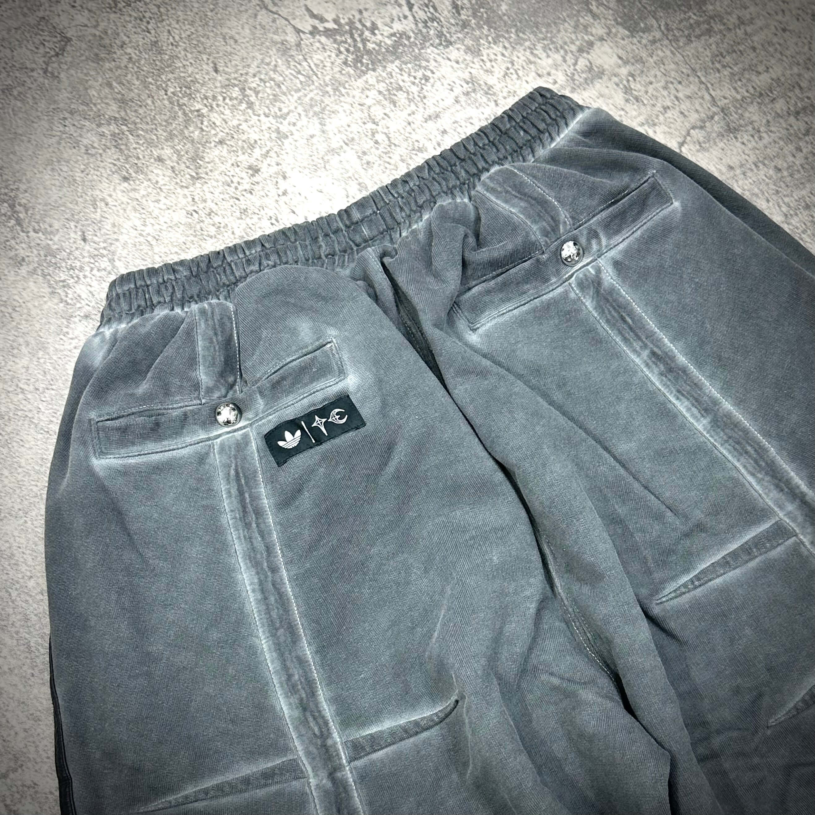 Thug Club x adidas Originals Sweat Jort featuring stylish back pockets and elastic waistband in gray.