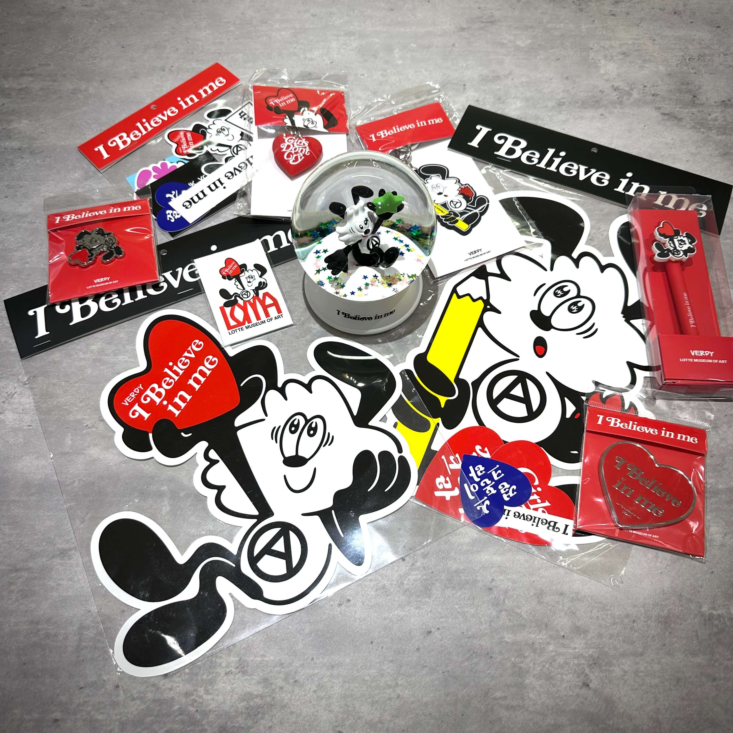 Verdy x Lottemuseum accessories including stickers, pens, and other colorful items with unique designs.