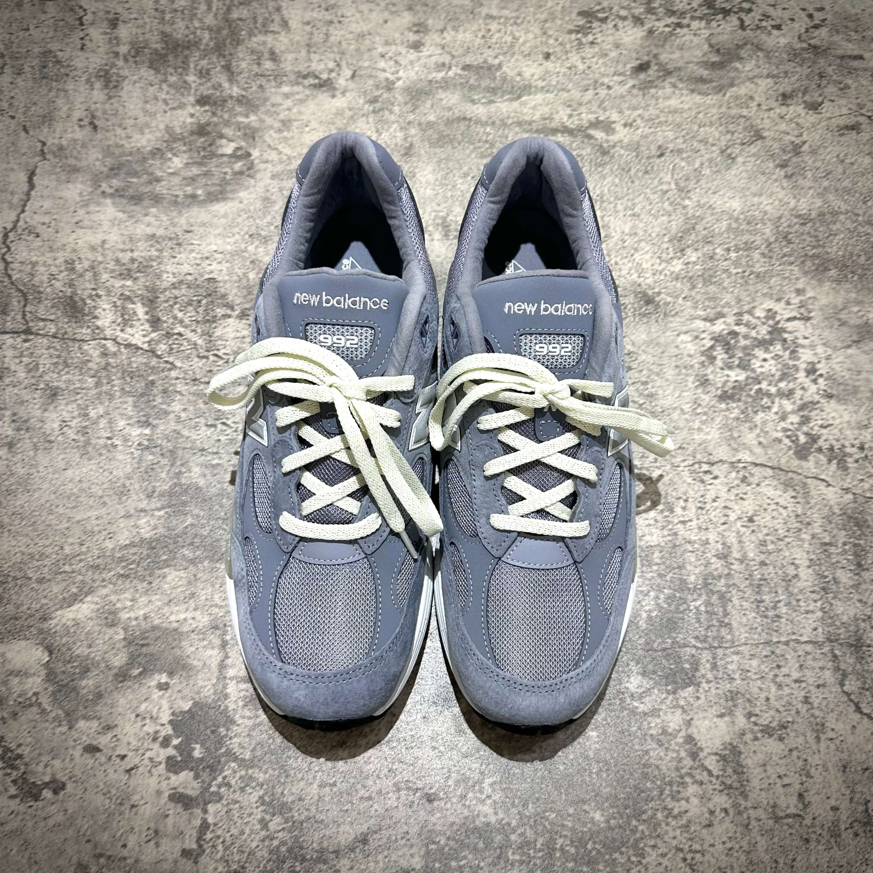 MiUSA Kith x New Balance 992 Argon grey sneakers top view with white laces and mesh detailing.