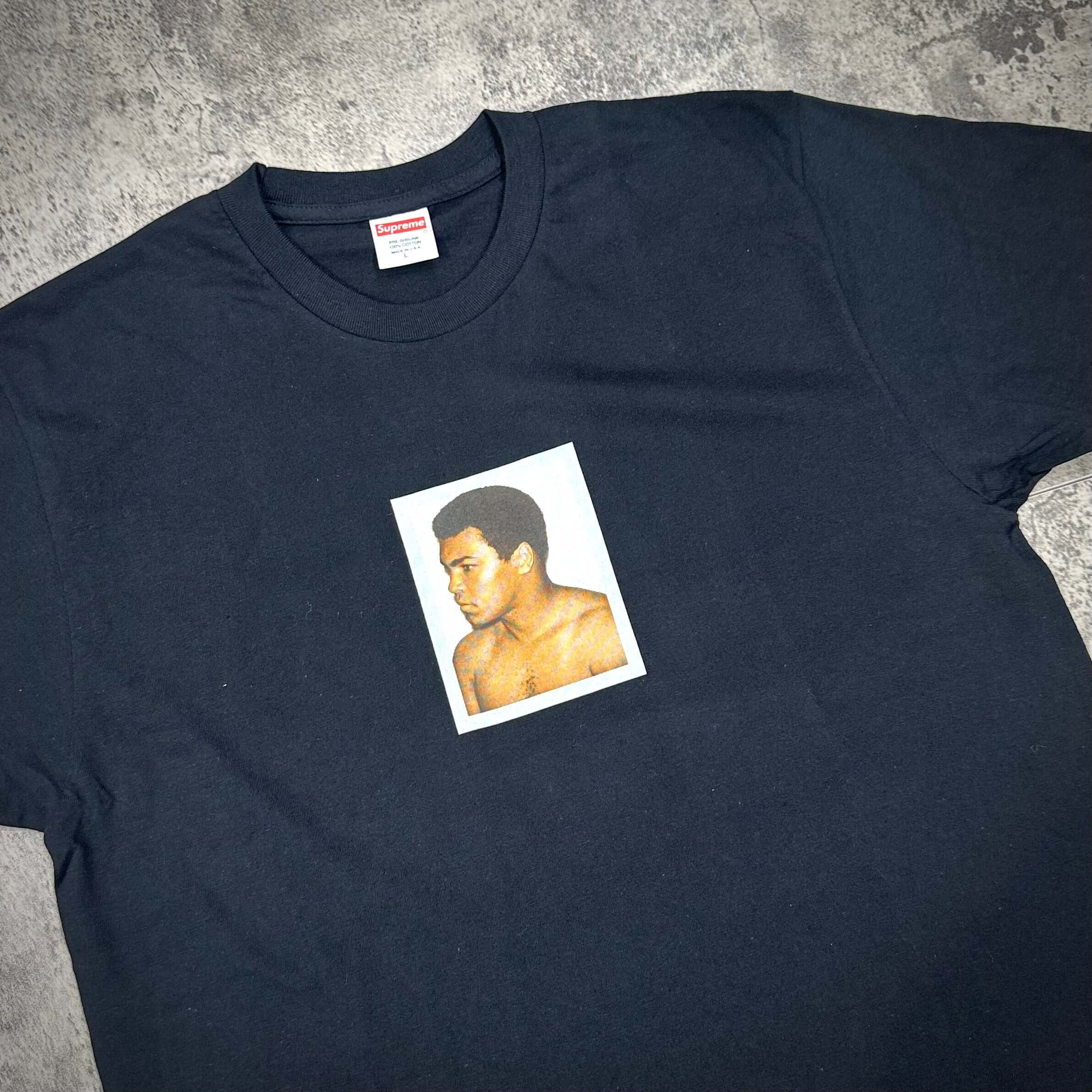 Supreme AliWarhol Tee - Black featuring a graphic print of a profile portrait on a black background.
