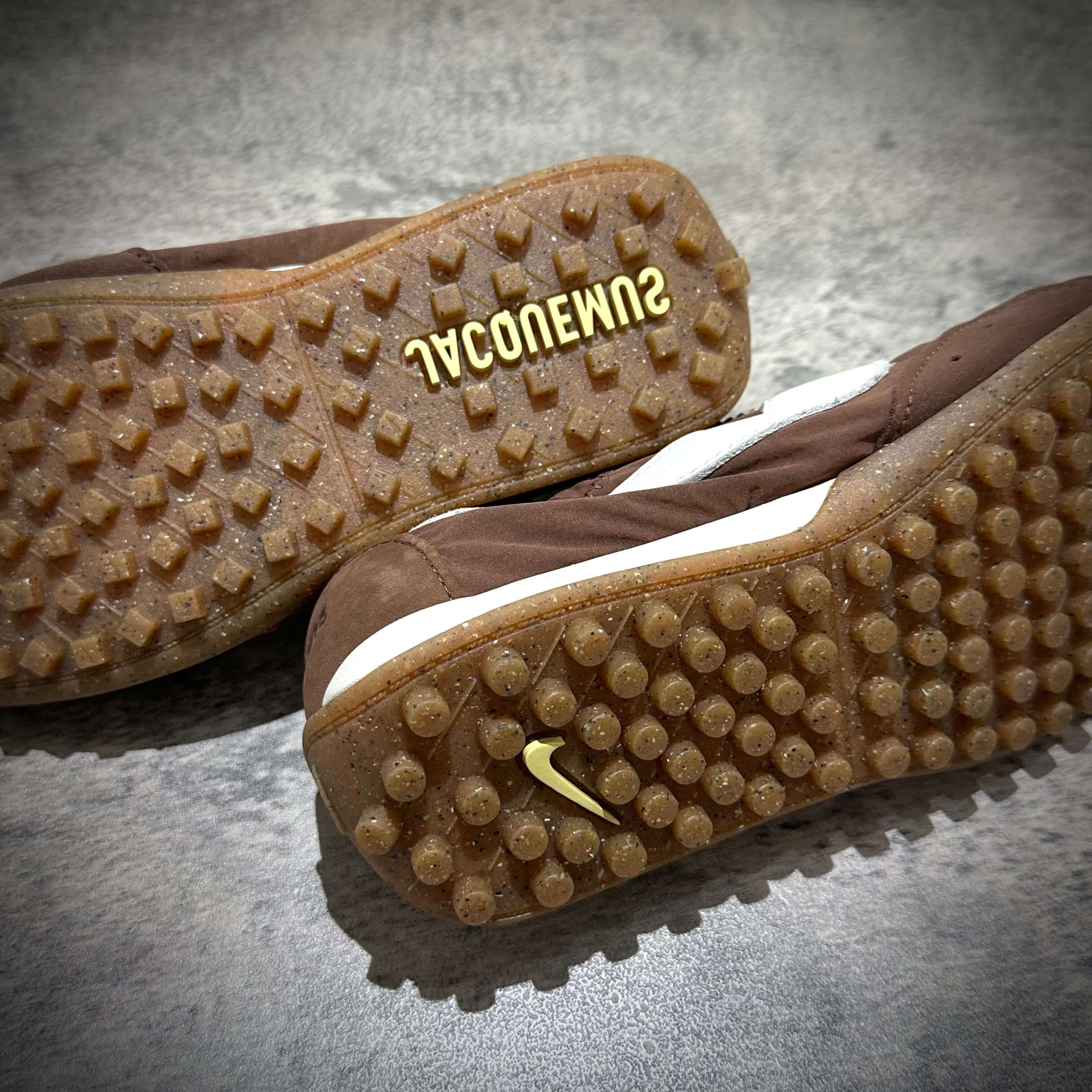 Bottom view of Jacquemus x Nike Moon Shoe SP - Brown showcasing unique sole design.