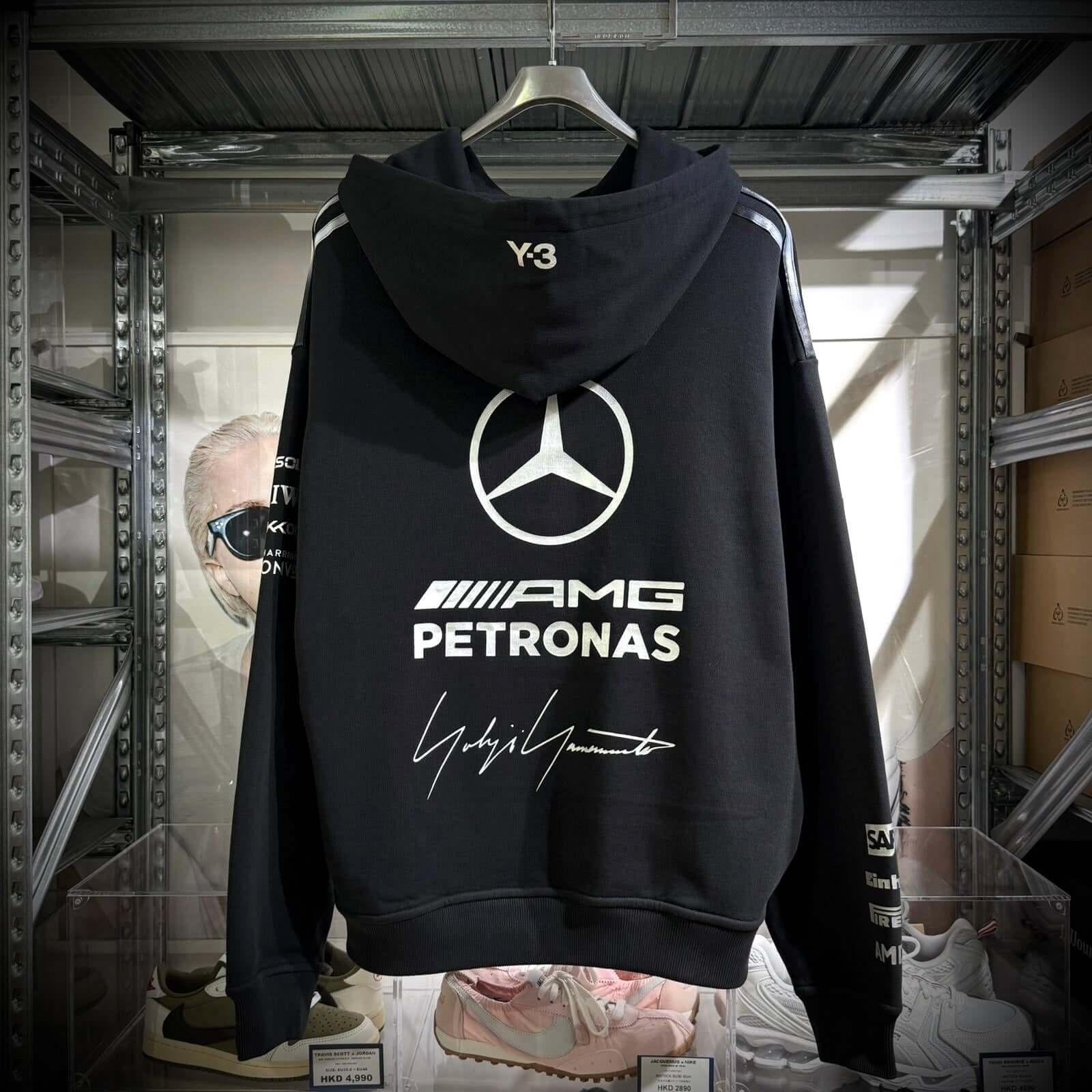 Y-3 x Mercedes AMG Petronas F1 Hoodie displayed in black with logo and signature on the back.