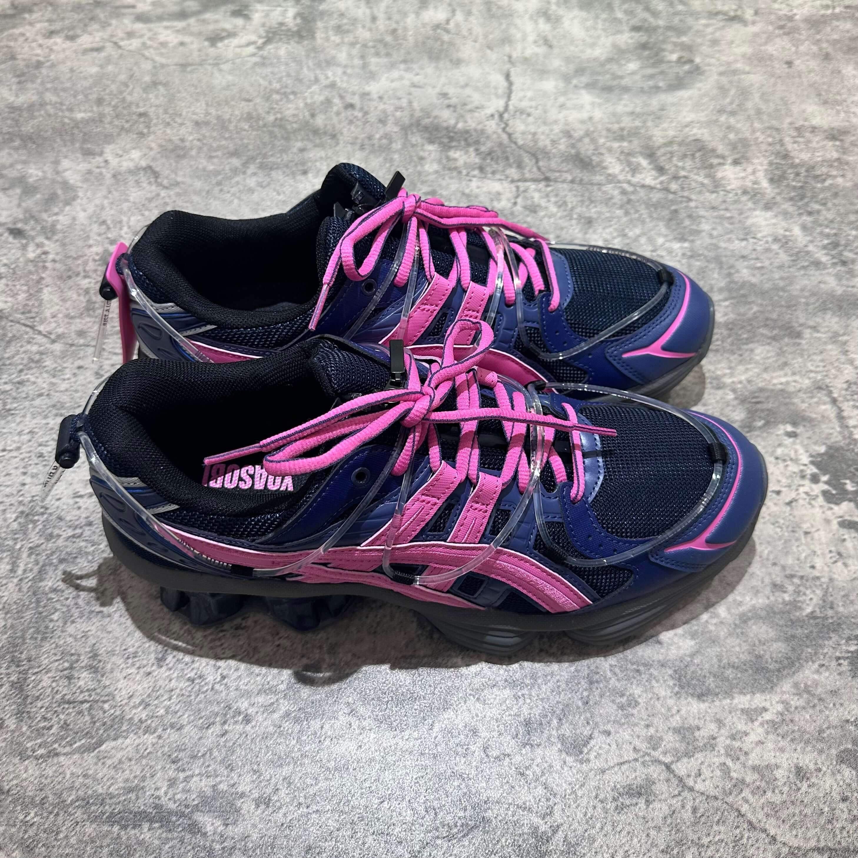 Yoasobi x Asics Gel Kinetic Fluent Y in Midnight and Dragon Fruit colorway, featuring a stylish design and bold pink accents.