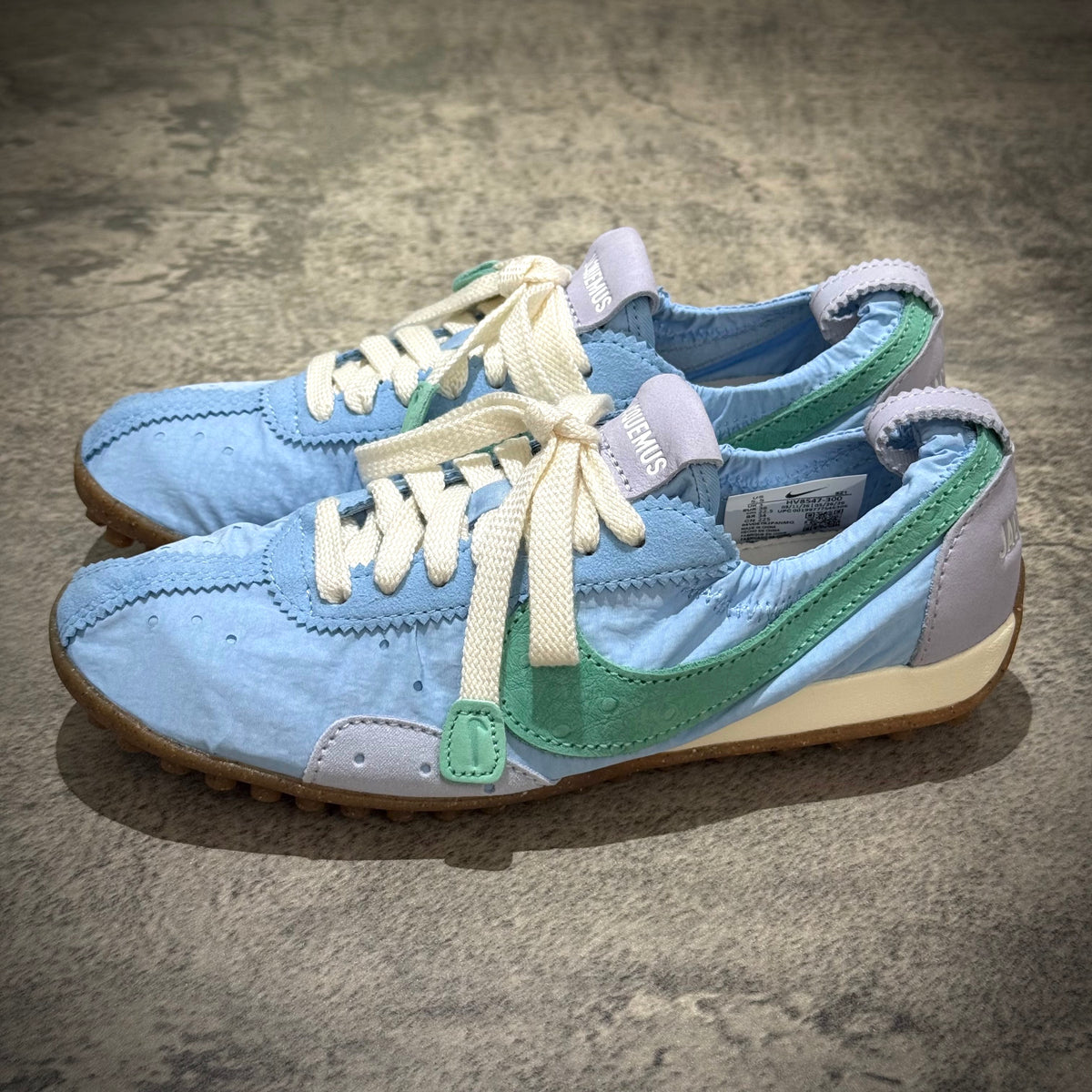 Jacquemus x Nike Moon Shoe SP - Emerald Rise HV8547-300 side view on a textured surface