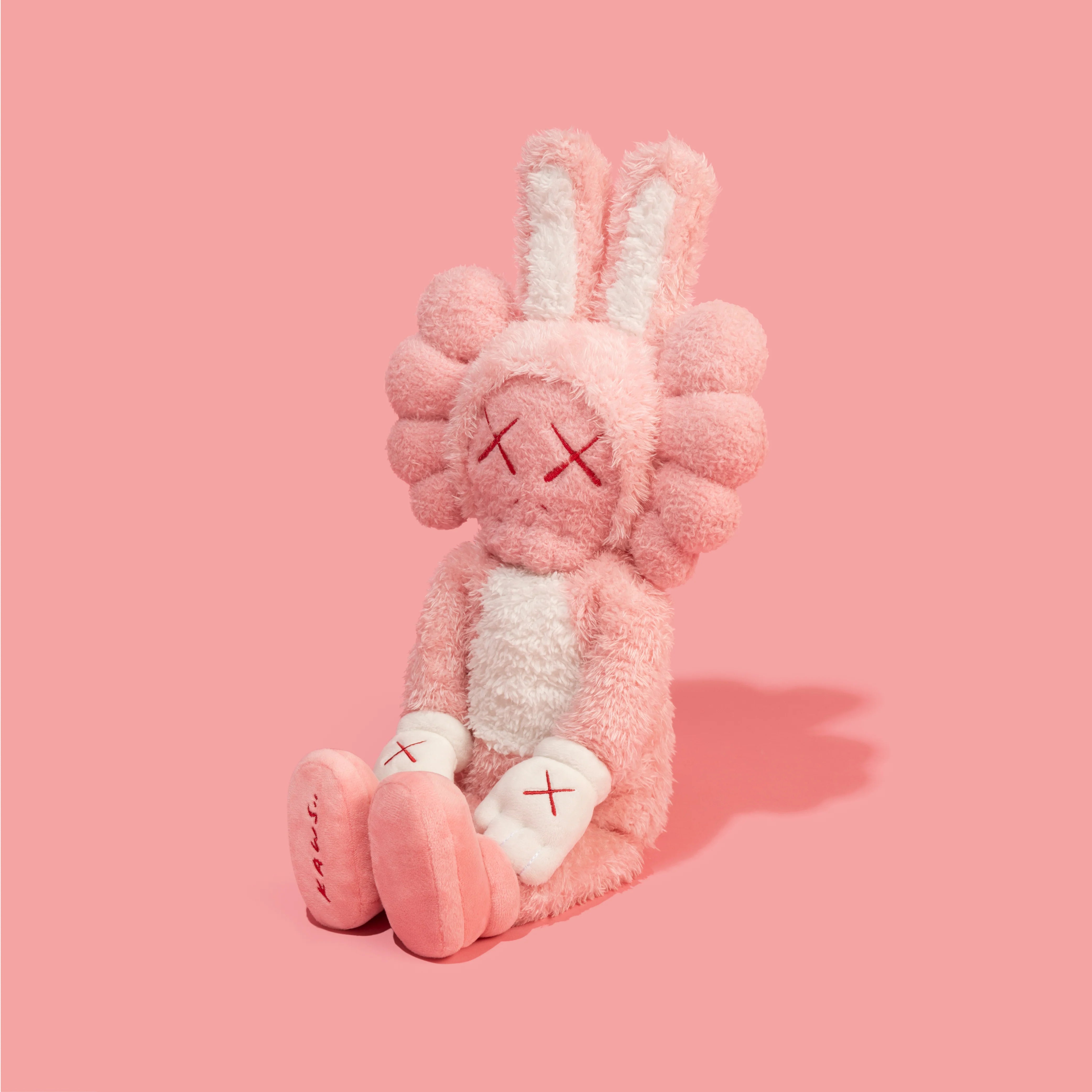 Kaws online plush pink